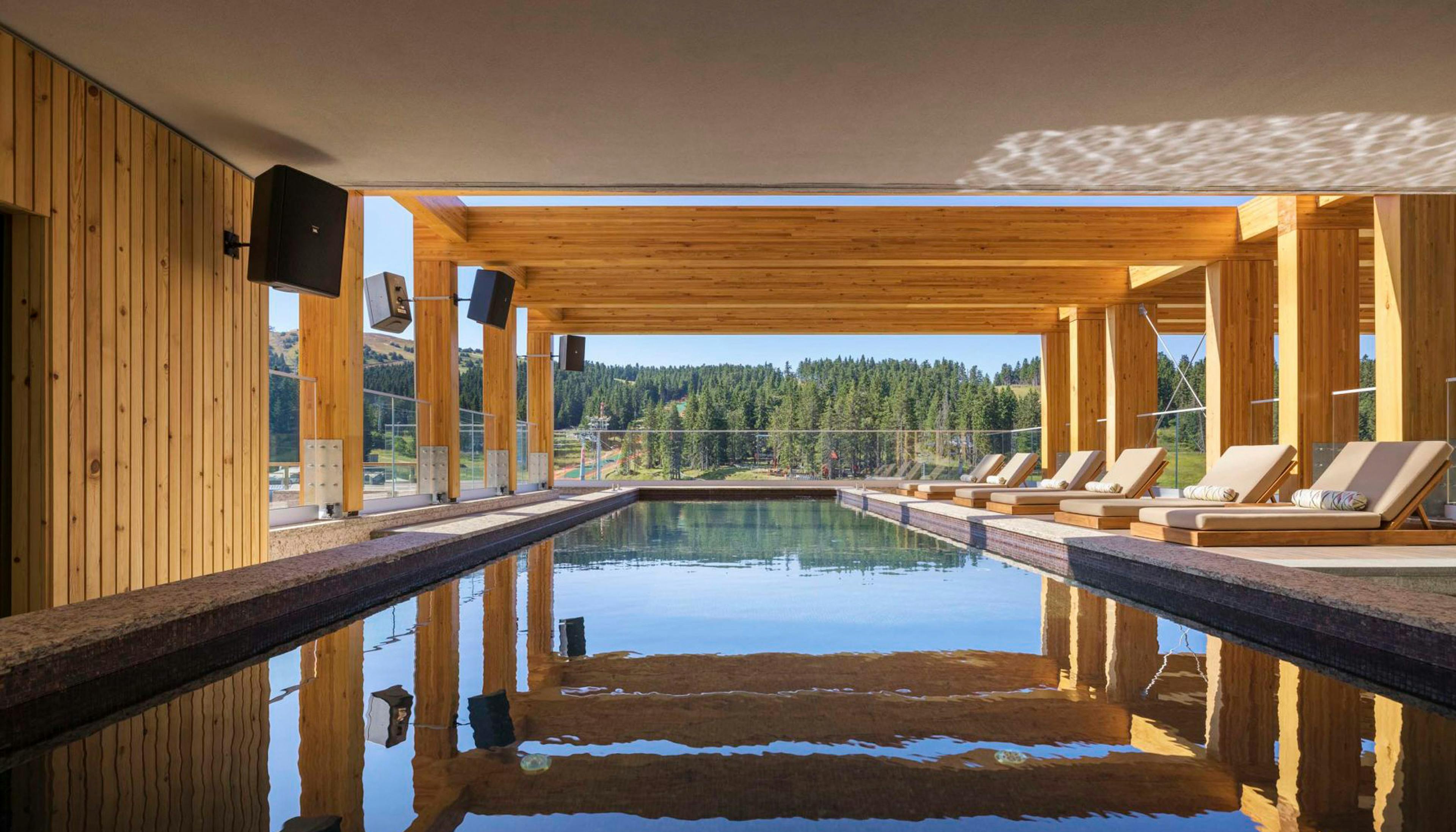 Pool covered with glulam beams
