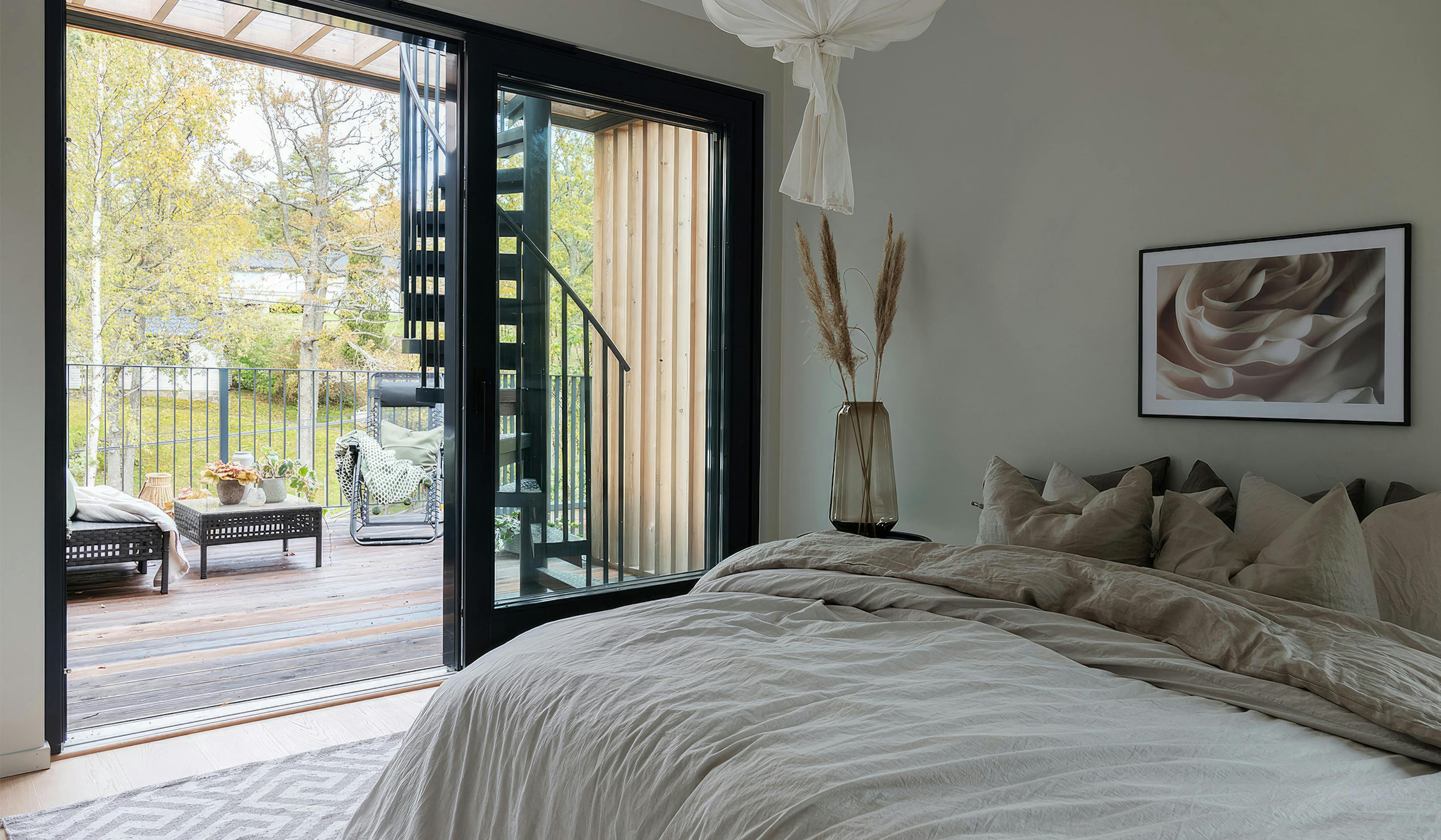 Beautiful light bedroom with terrace exit