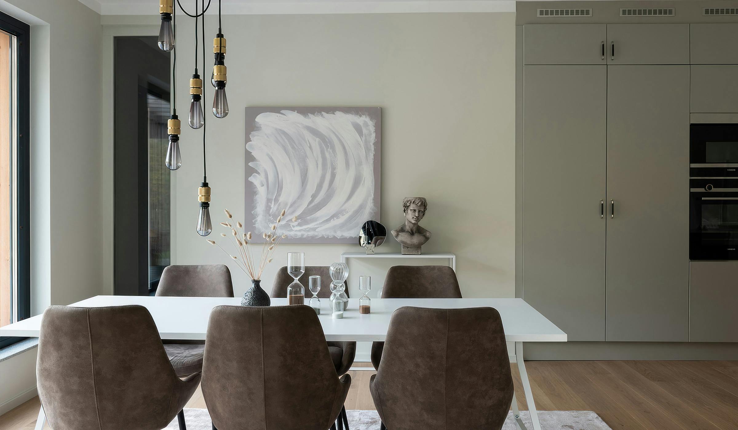 Minimalist dining room with artwork