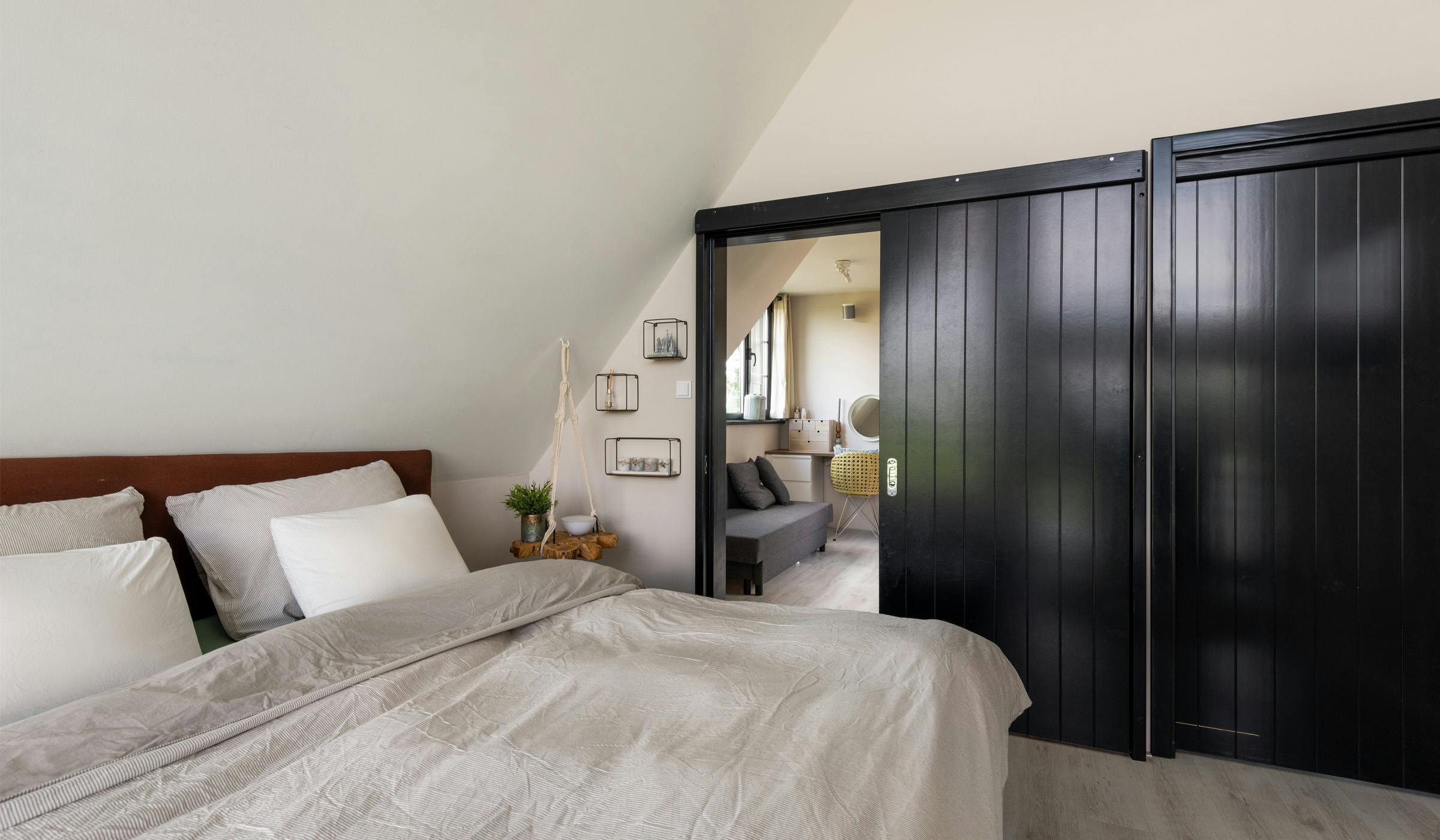 Wooden slide door in bedroom