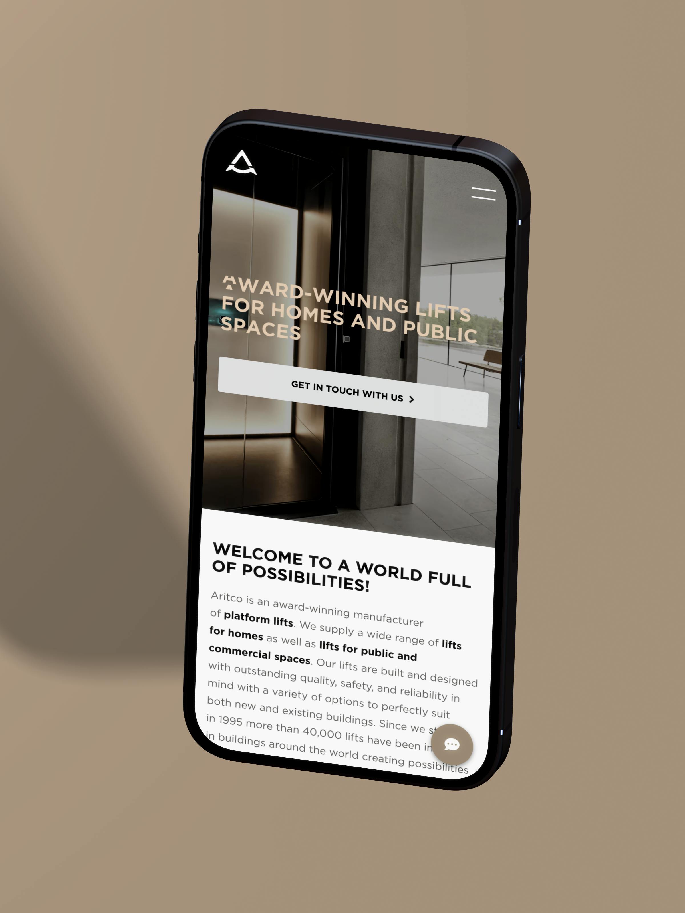 Mockup of a mobile phone with the Aritco website on the screen