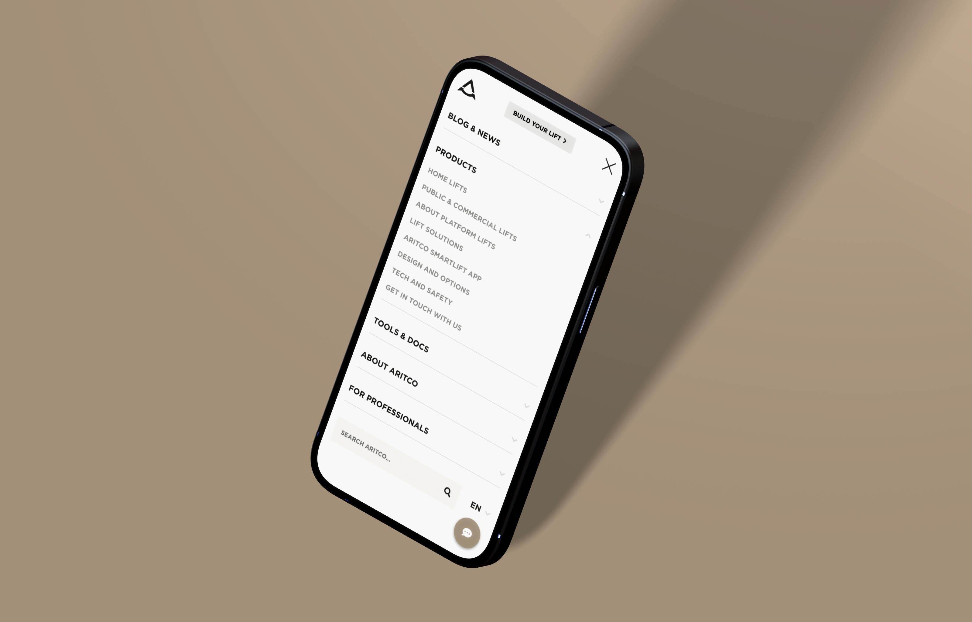 Mockup of a mobile phone with the Aritco website on the screen