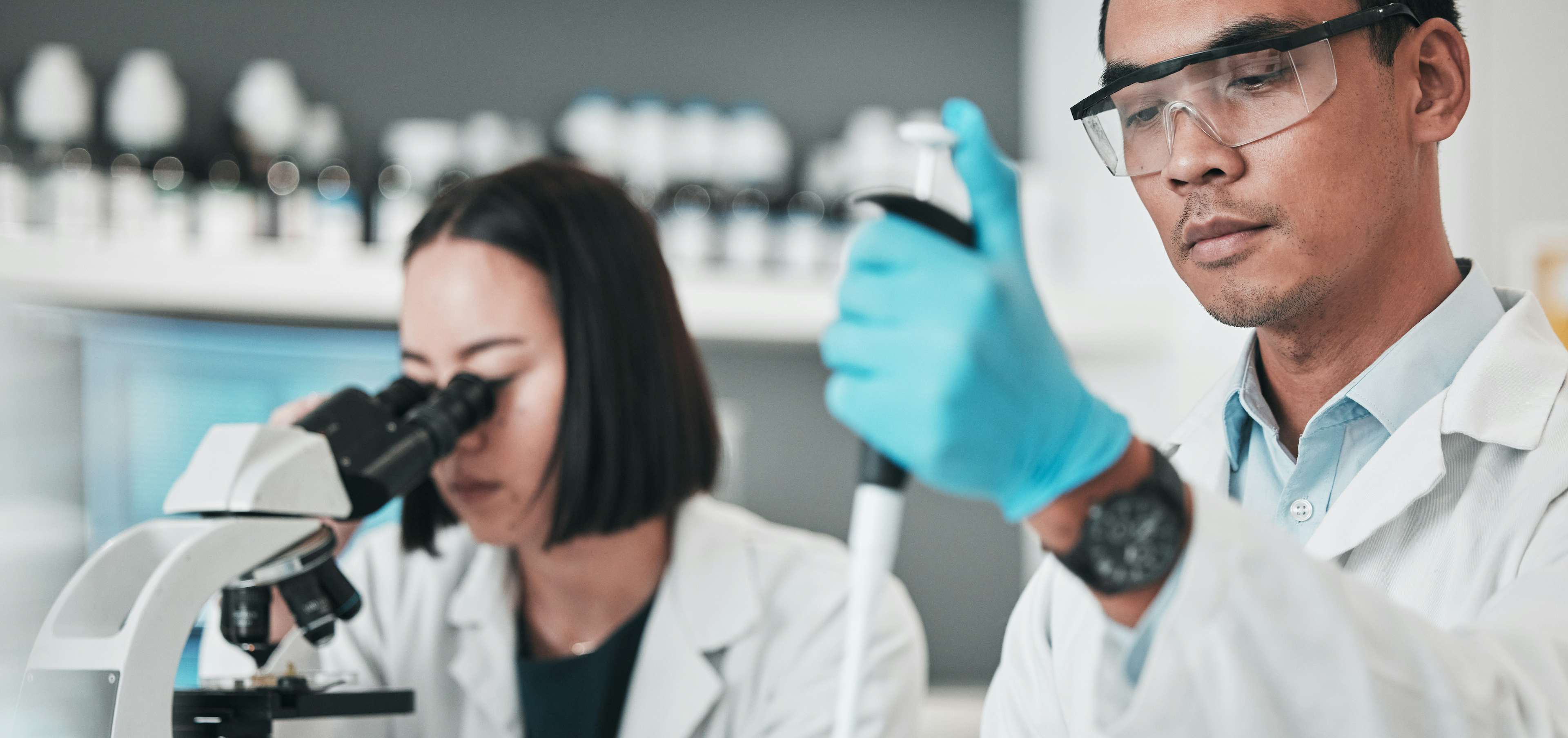 Man and woman working in a medical research lab