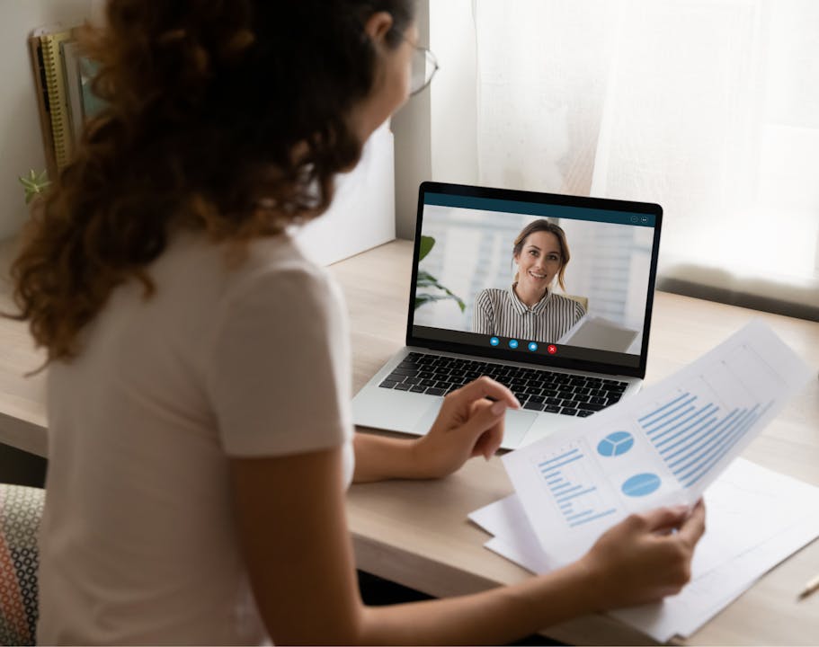 Female student having a virtual meeting with her Fashion Sustainability course mentor