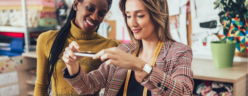 Women discussing the business side of fashion and luxury