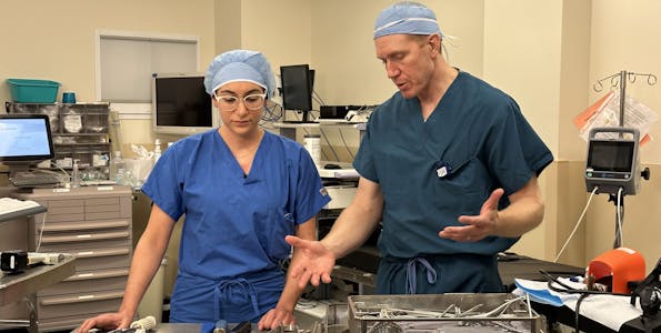 Orthopedic surgeons in an operating room
