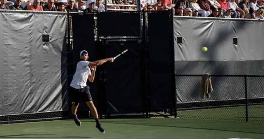 Athlete playing tennis and avoiding a shoulder injury