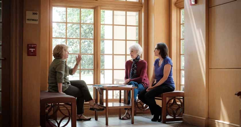 People discussing the human brain and psychology