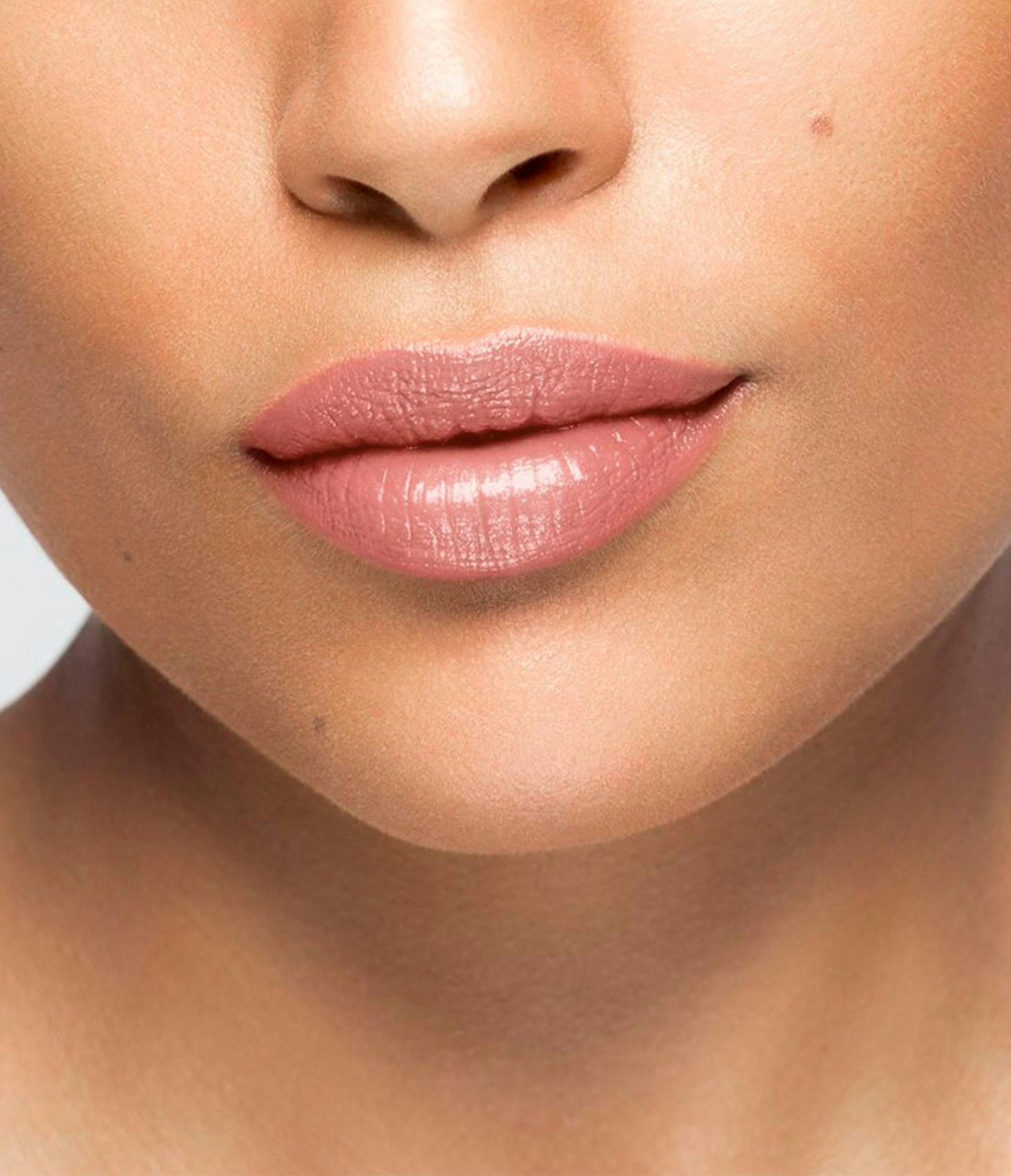 La bouche rouge Pink balm lipstick shade on the lips of a medium skin model