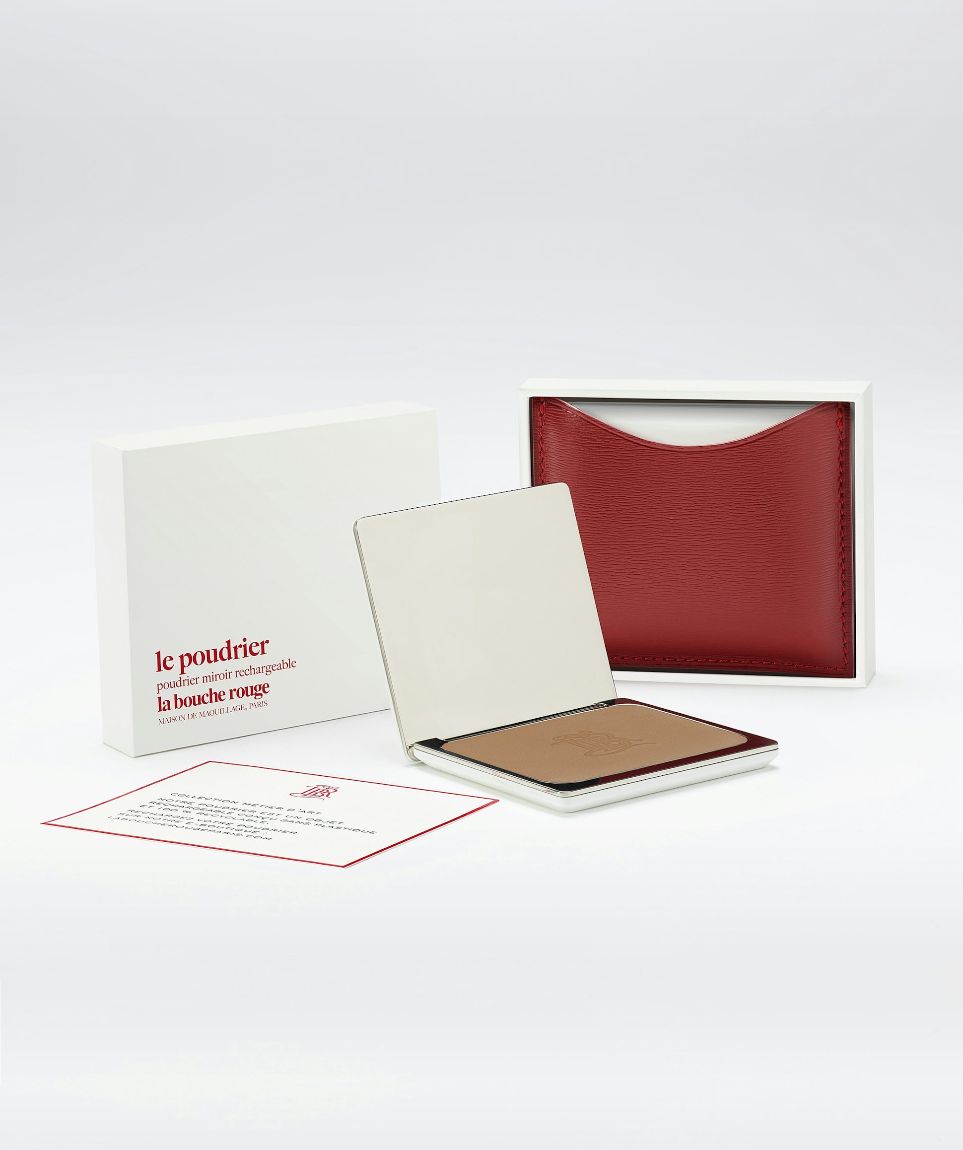 La bouche rouge La Terre Brune in the white box with the red leather compact case