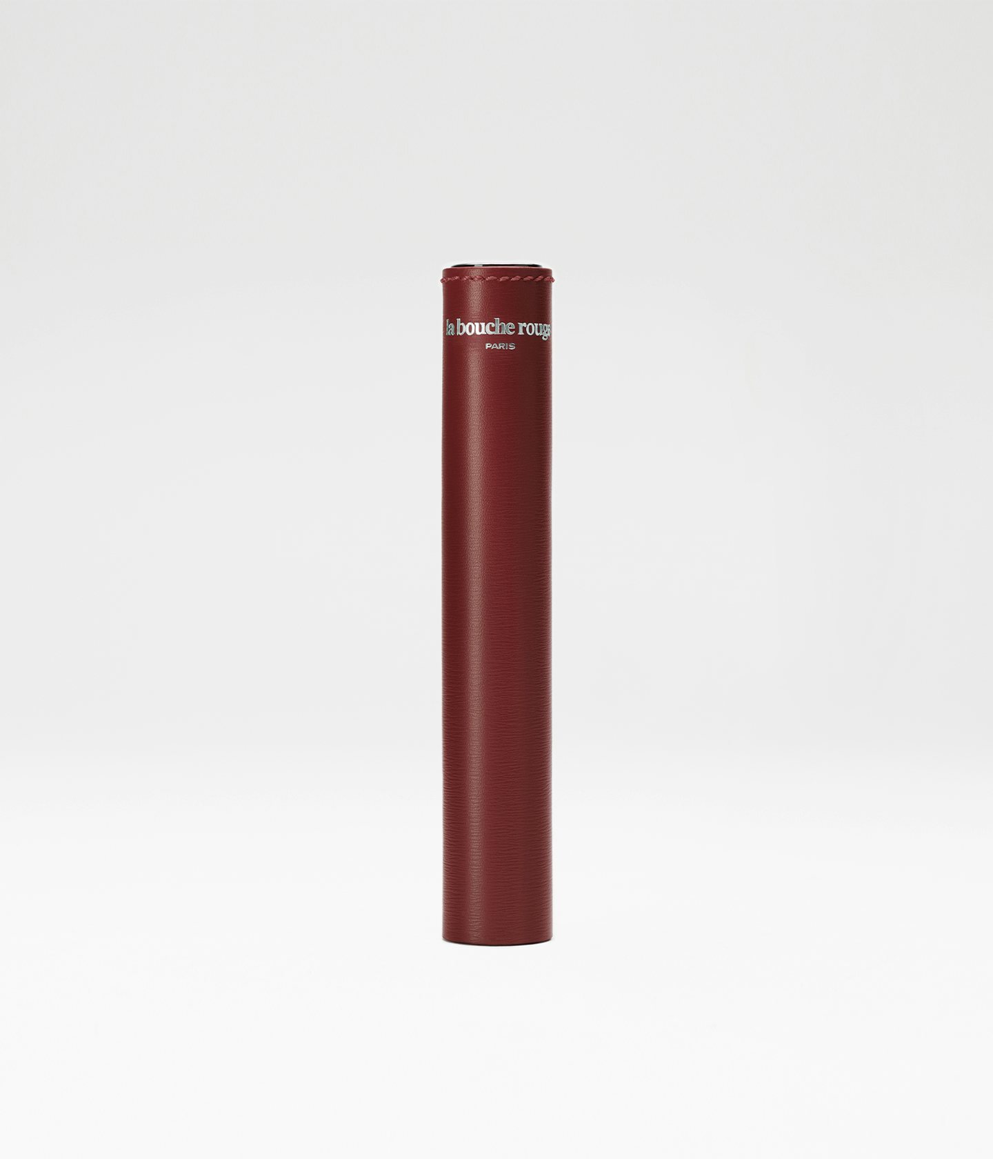 La bouche rouge Chocolate leather sleeve with brand engraving - front