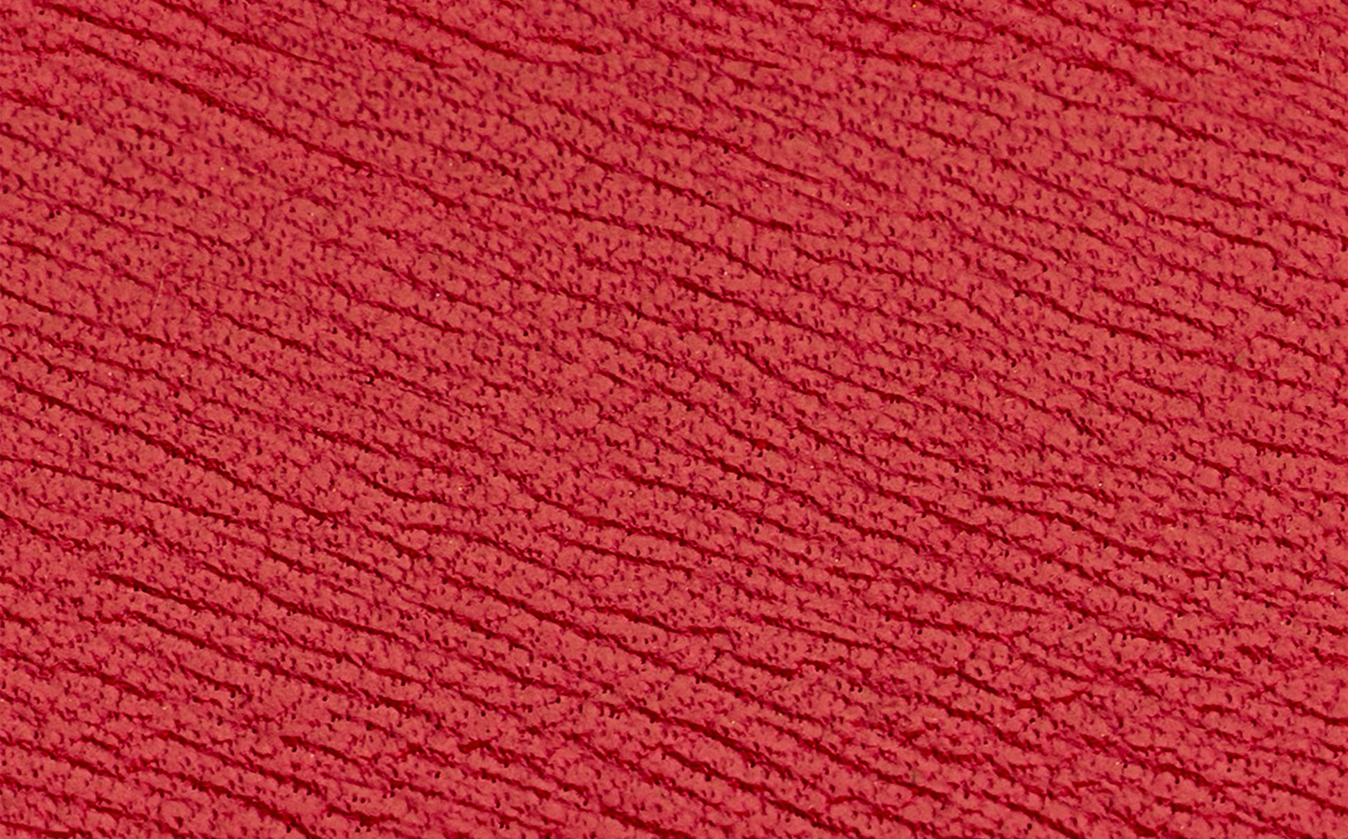 La bouche rouge texture de l'écrin en cuir upcyclé rouge
