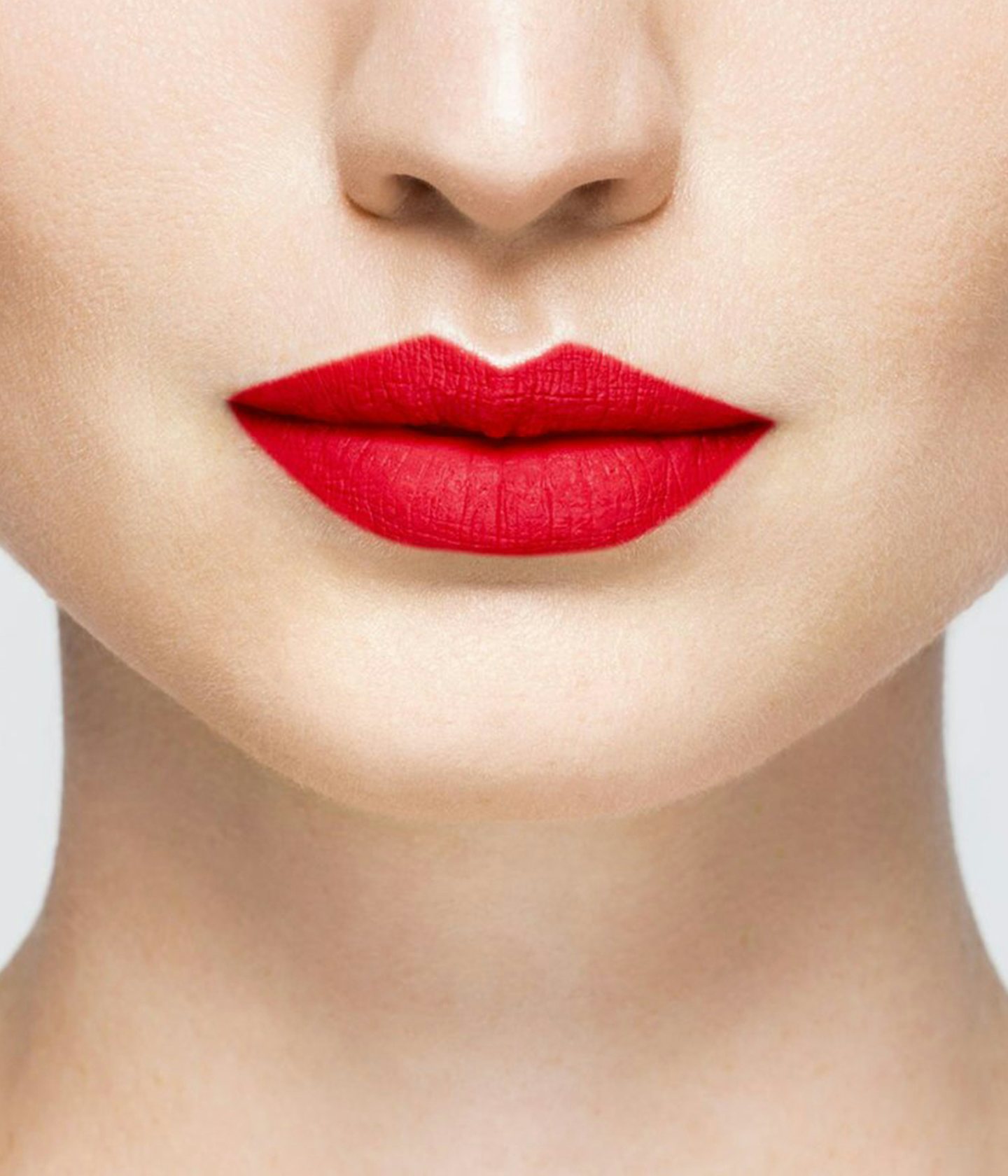 La bouche rouge Rouge Vendôme lipstick shade on the lips of a fair skin model