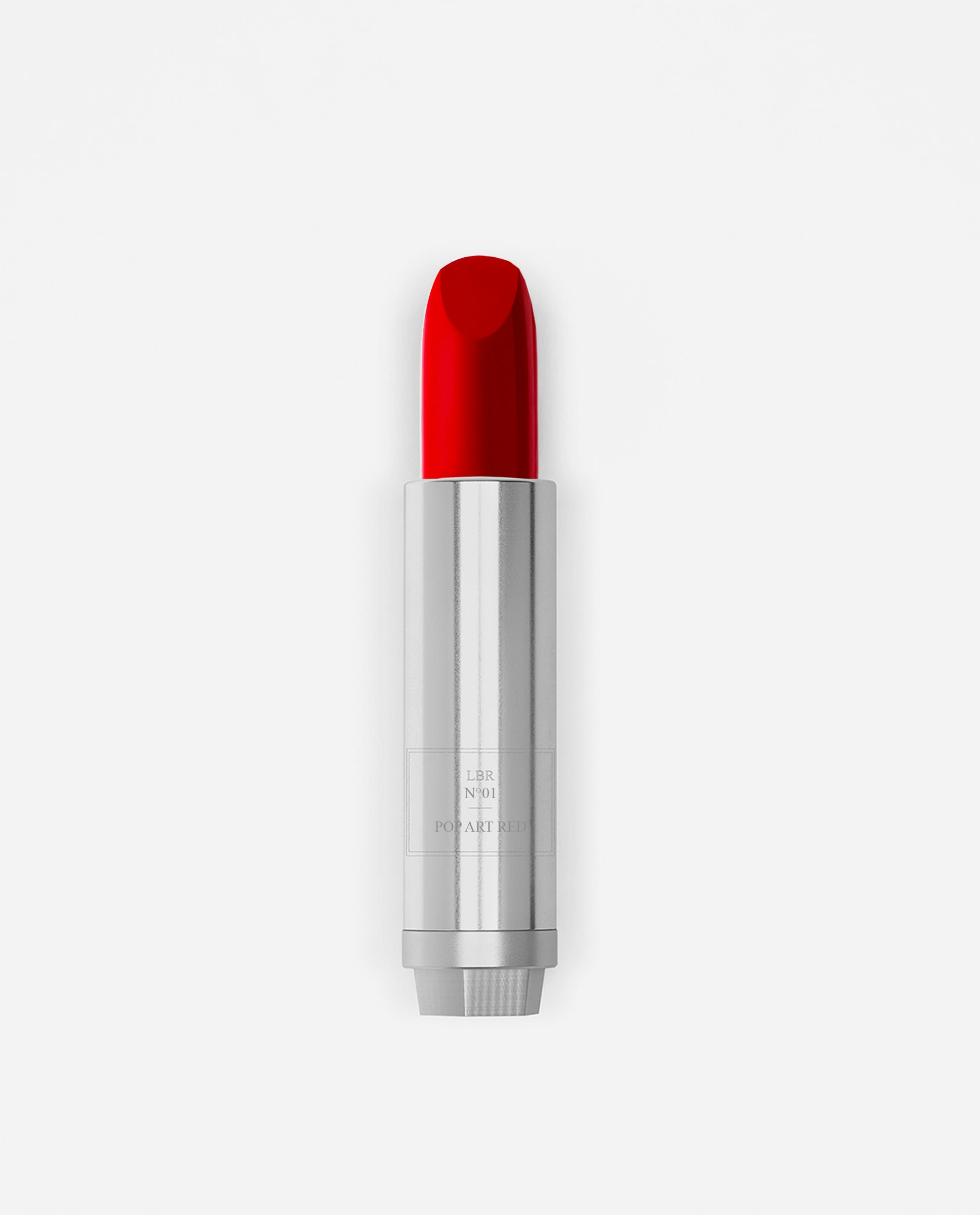 La bouche rouge rouge à lèvres Pop Art Red dans sa recharge en metal 