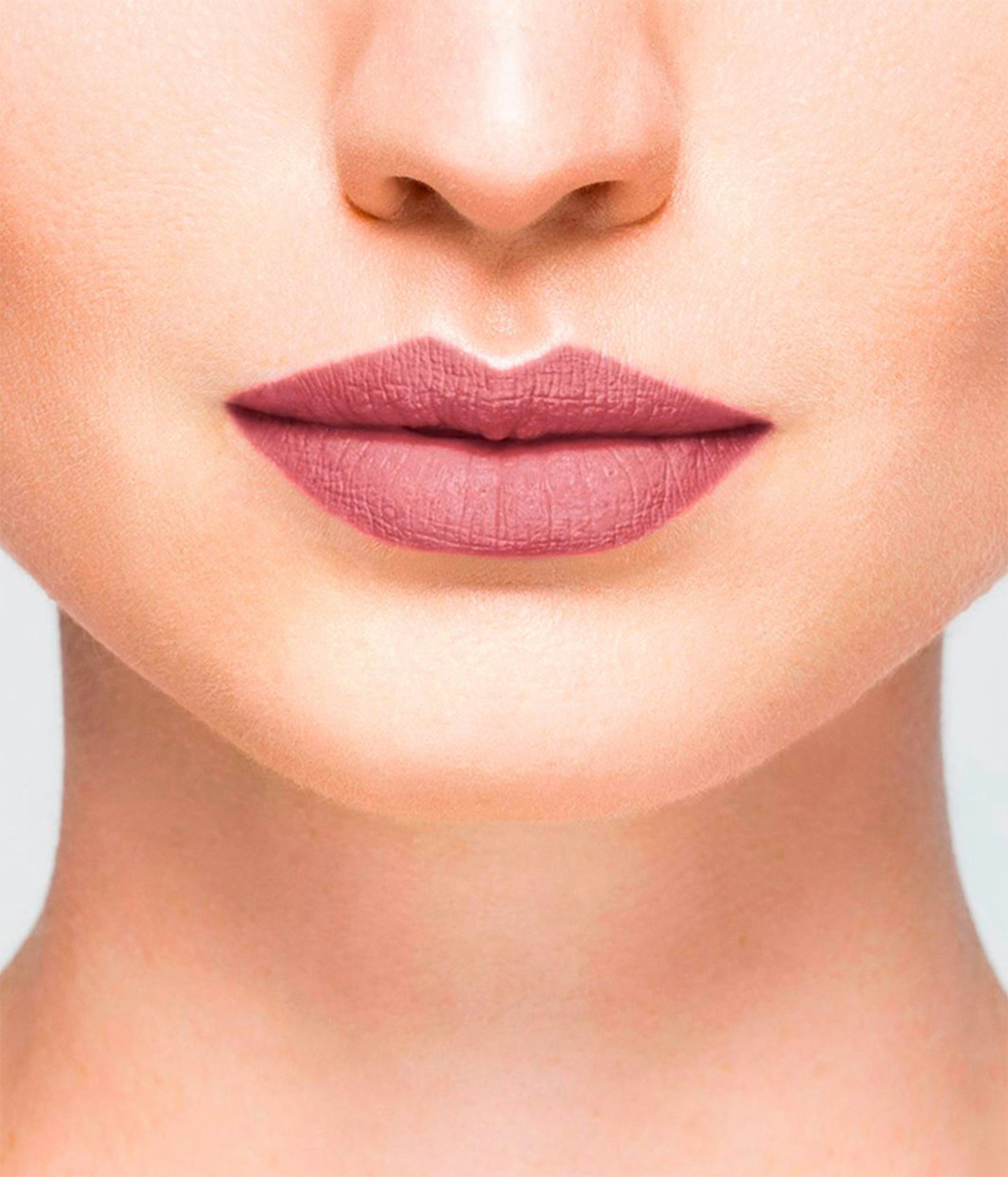 La bouche rouge Le Rose Saint Germain lipstick shade on the lips of a fair skin model