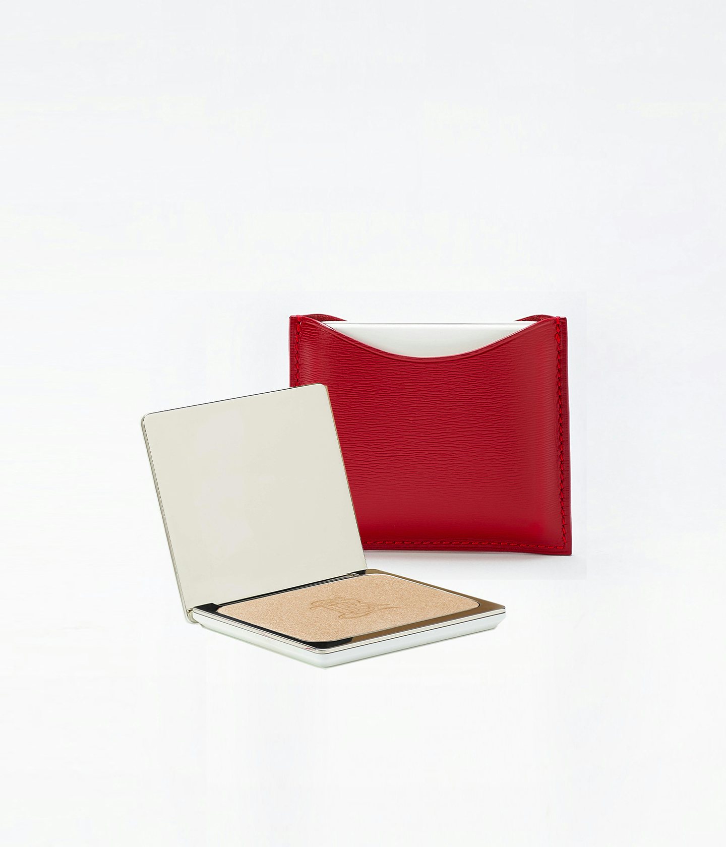 La bouche rouge La Lumière Highlighter in the red leather compact case 