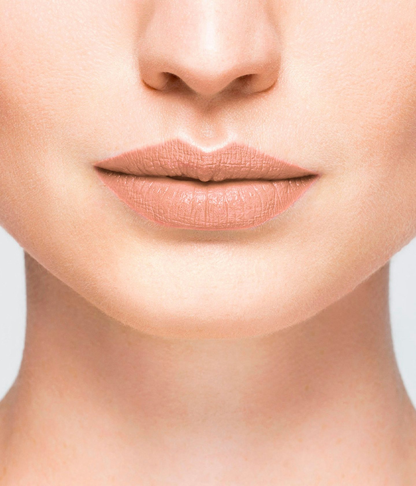 La bouche rouge Le Nude Veronika lipstick shade on the lips of a fair skin model