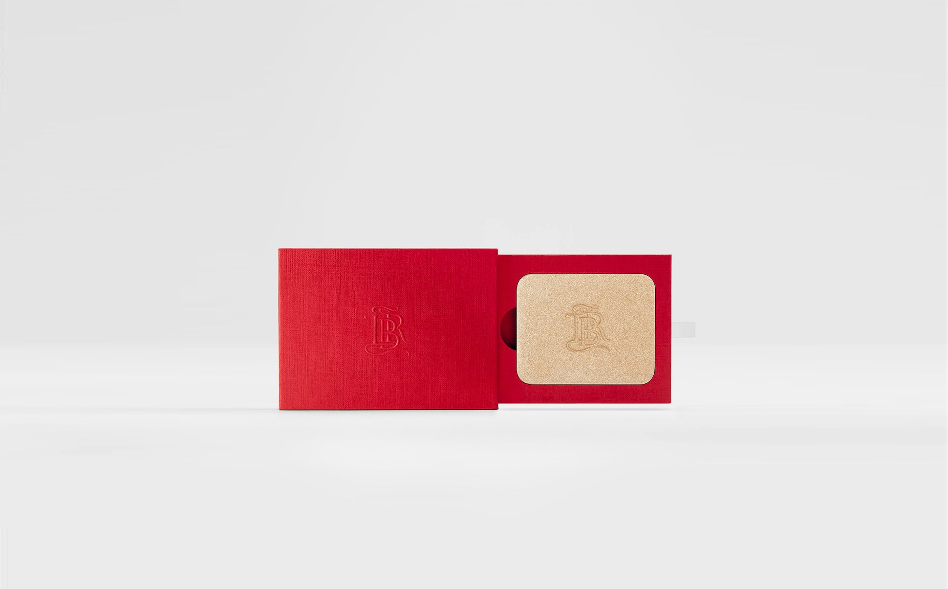 La bouche rouge La Lumière highlighter in the red paper case
