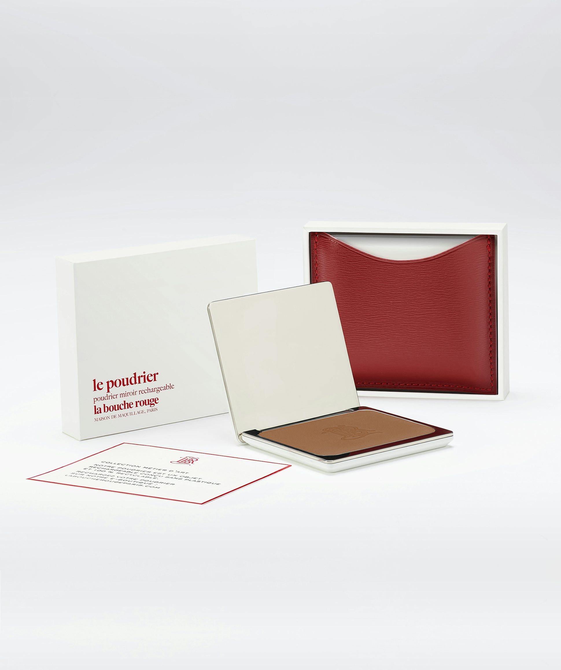 La bouche rouge La Terre Intense in the white box with the red leather compact case