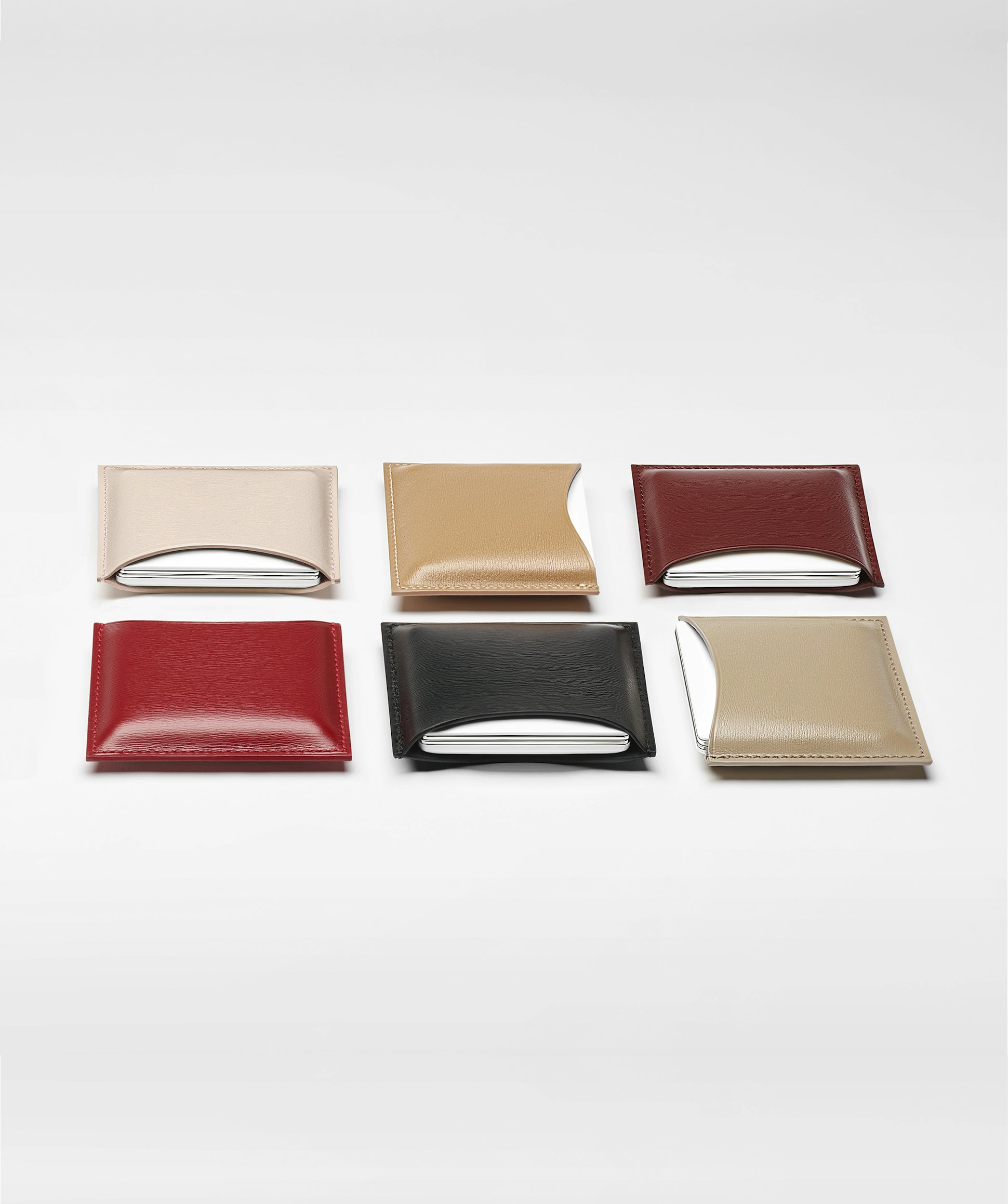 La bouche rouge, Paris leather compact case family in pink, camel, chocolate, red, black and beige