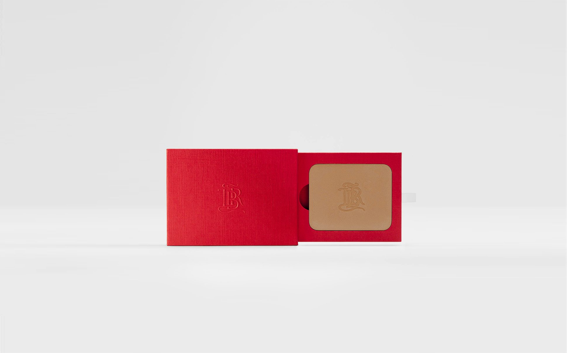 La bouche rouge La Terre Brune bronzer in the red paper case