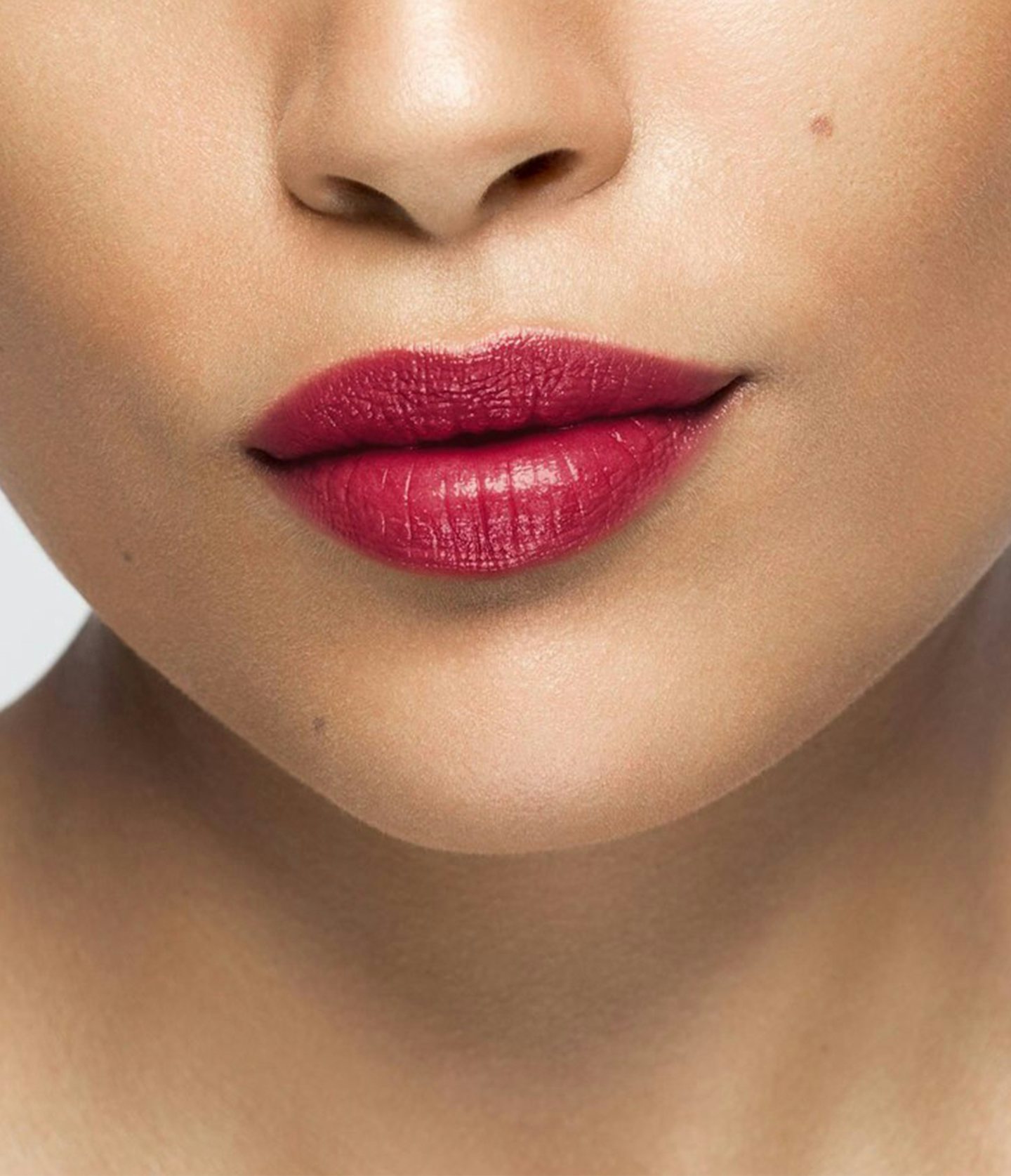 La bouche rouge Le Rouge Anja lipstick shade on the lips of a medium skin model