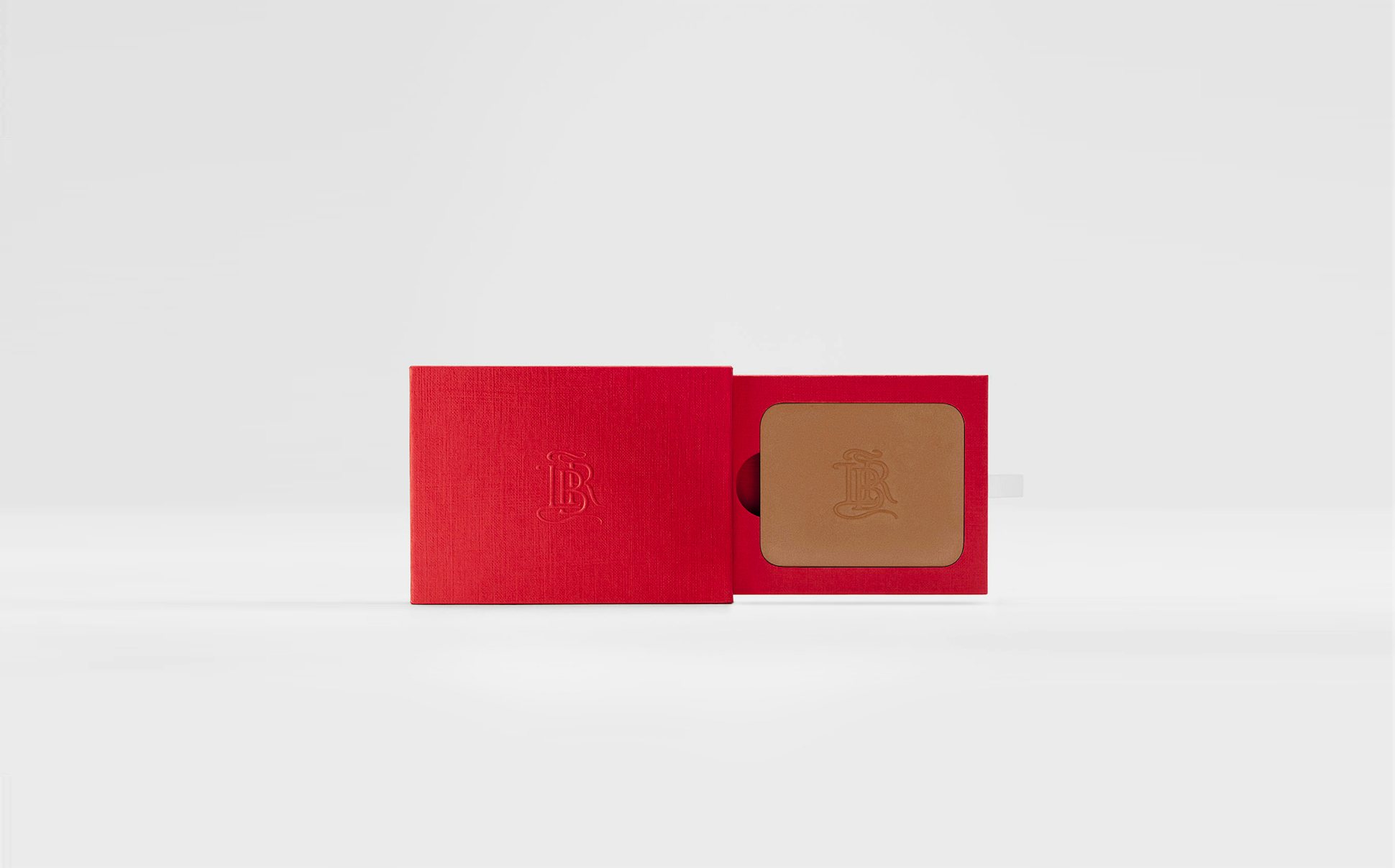 La bouche rouge La Terre Intense bronzer in the red paper case