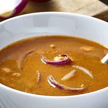 Fisherman’s soup with red onions
