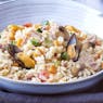 Seafood and tuna risotto with baby vegetables