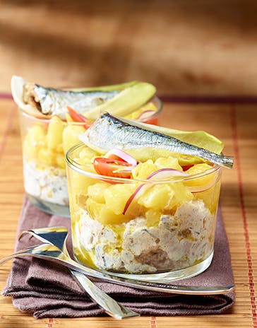 Sardines served in glasses with Piccalilli sauce