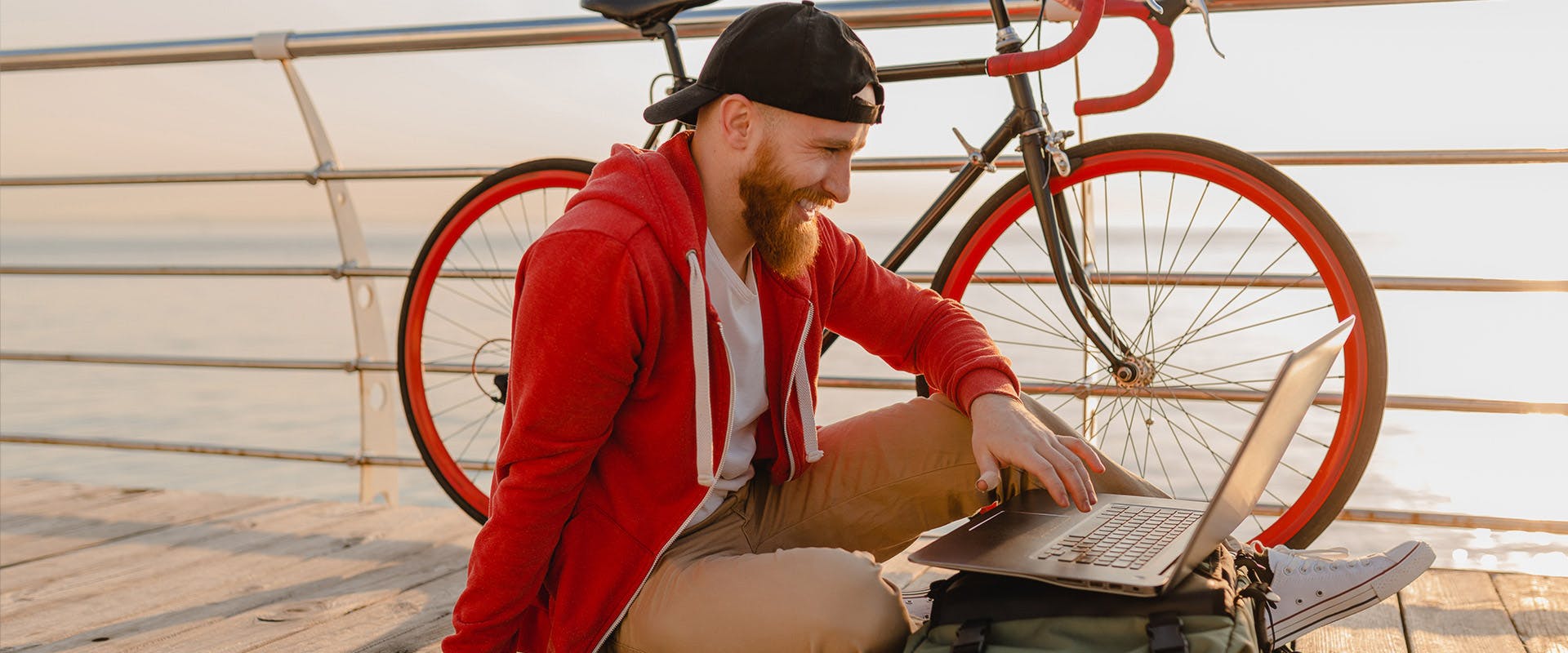 Freelancer working online on laptop as a remote team member