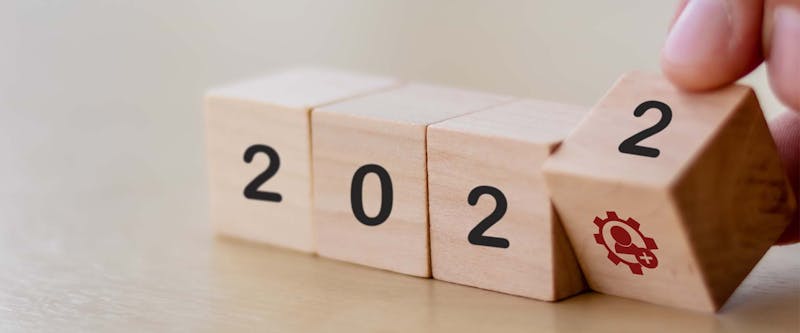 Upskilling and Reskilling: The Game of 2022 - wooden bricks with 2022 on them