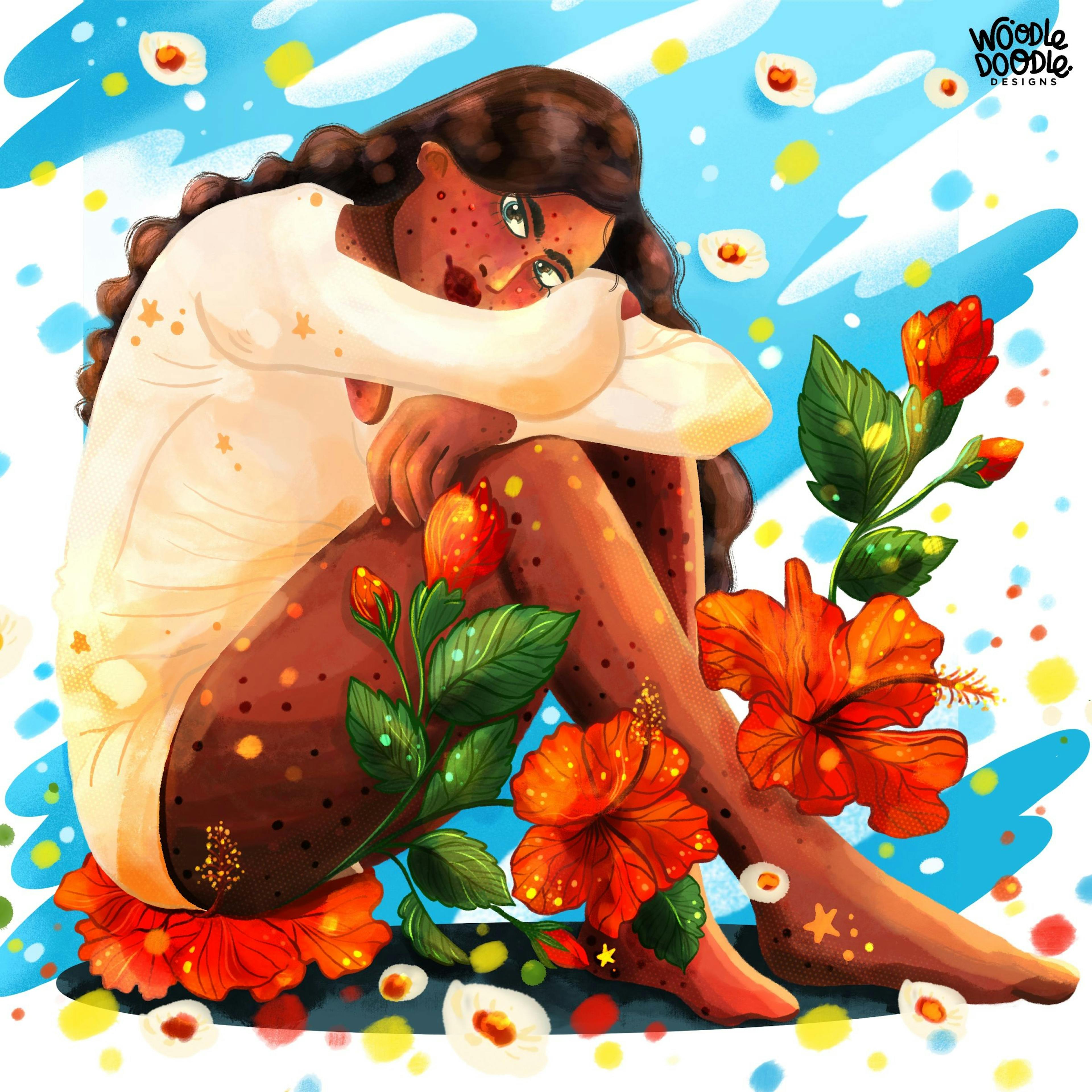 A woman hugging her knees