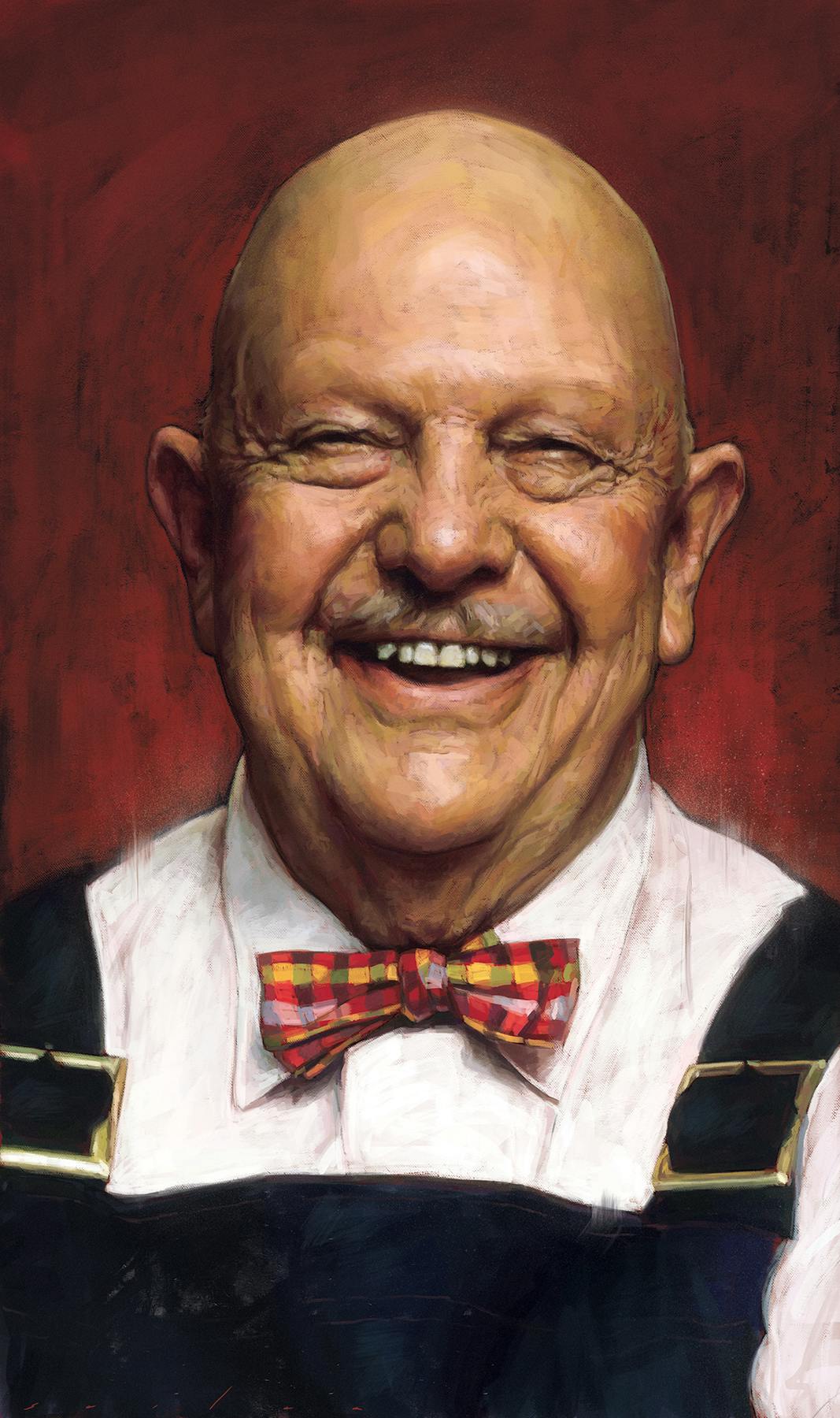 A portrait of a smiling man