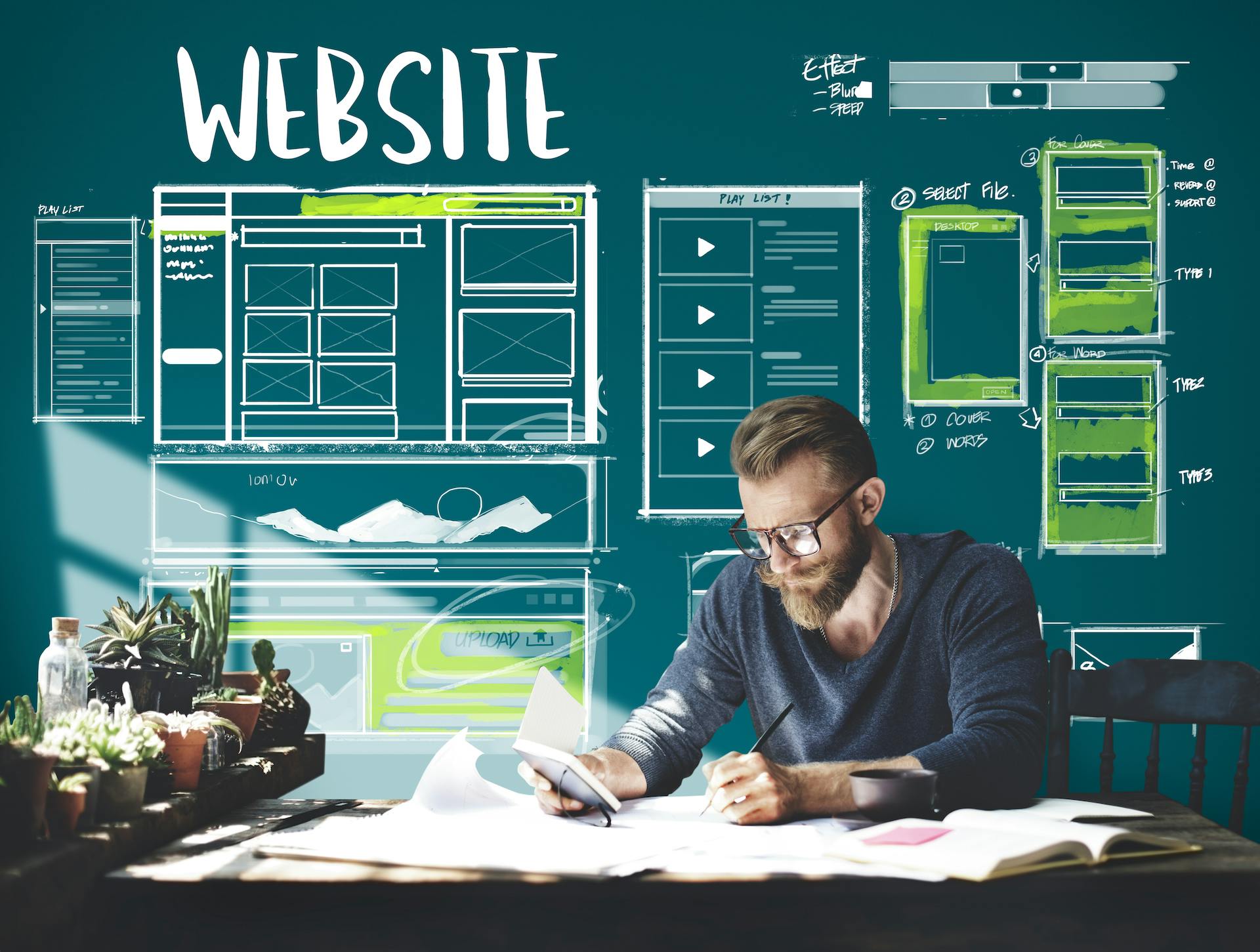 Stock photo of man at desk with graphic overlay of web design layout sketches in the background