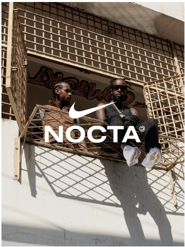Nike Nocta ad with two men looking down from a window