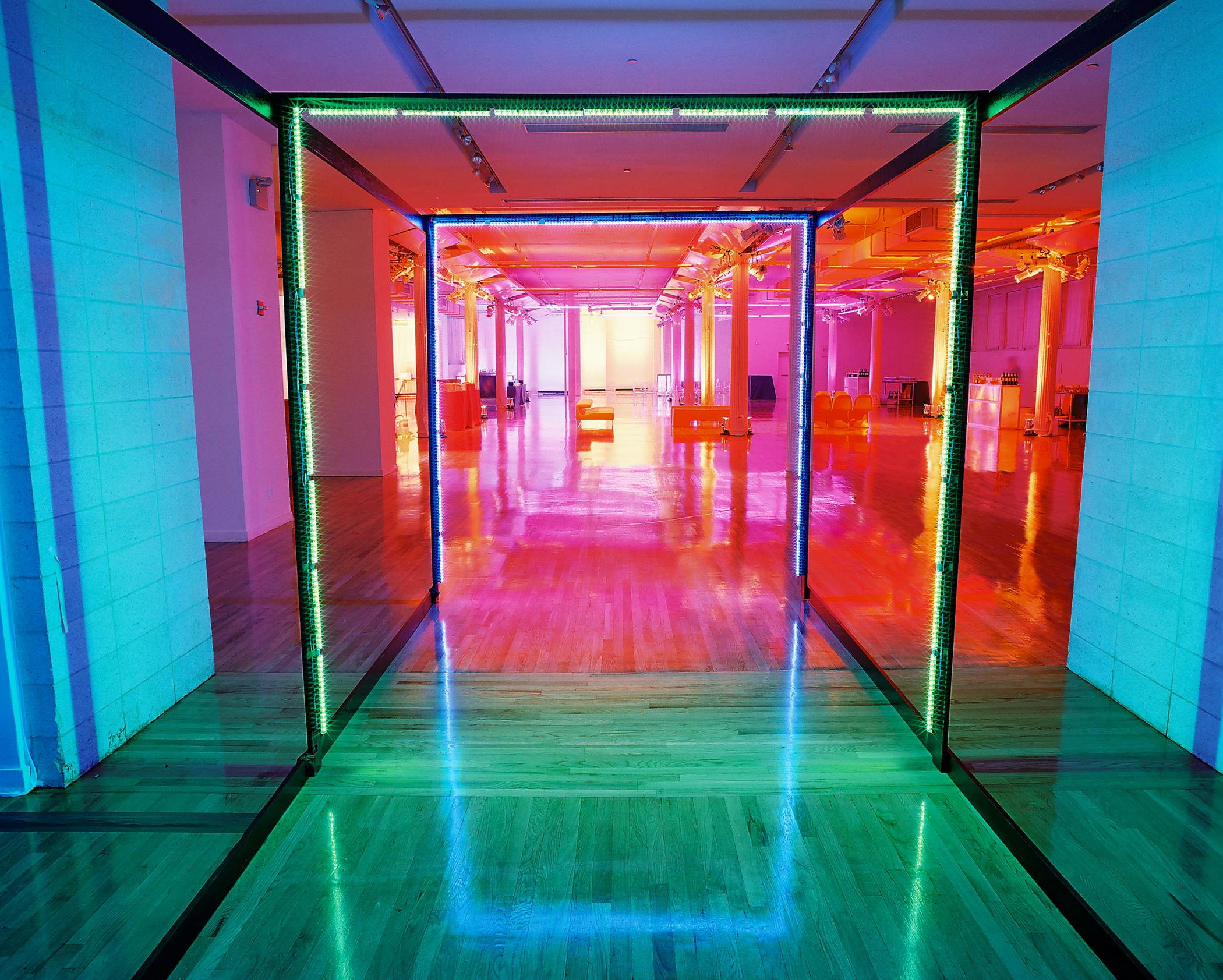 A hallway with brightly colored lights