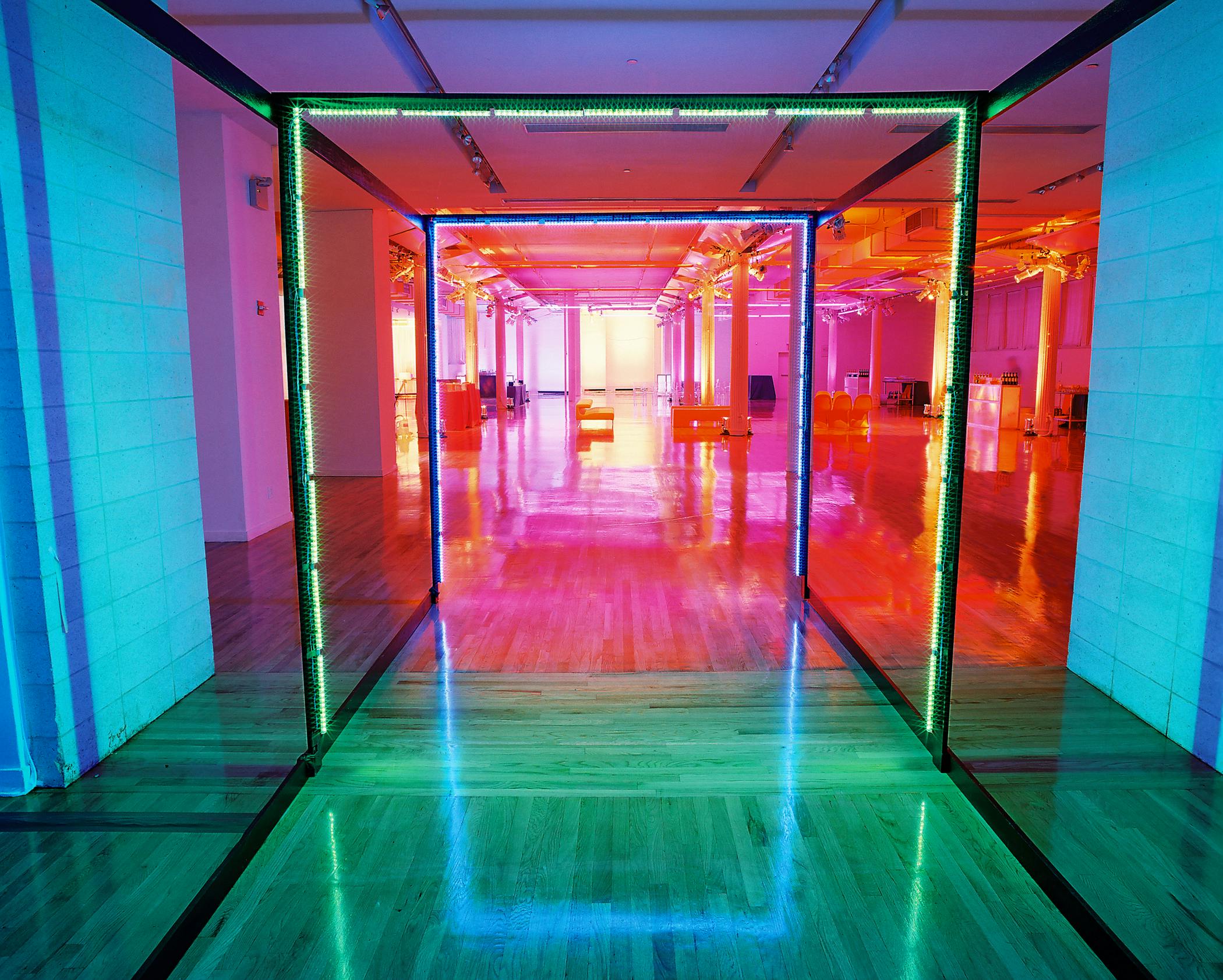 A hallway with brightly colored lights