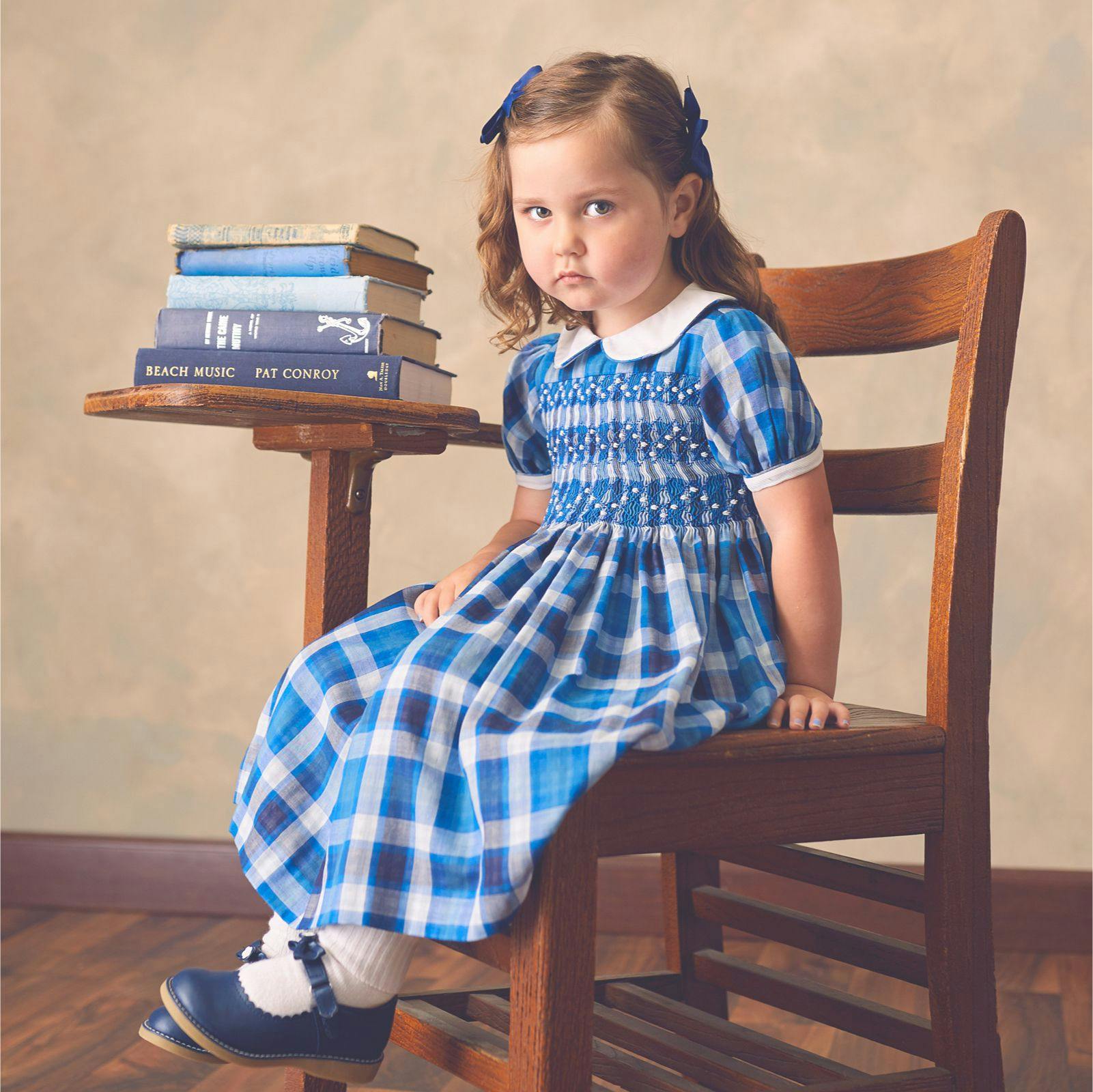 Girl at an old school desk