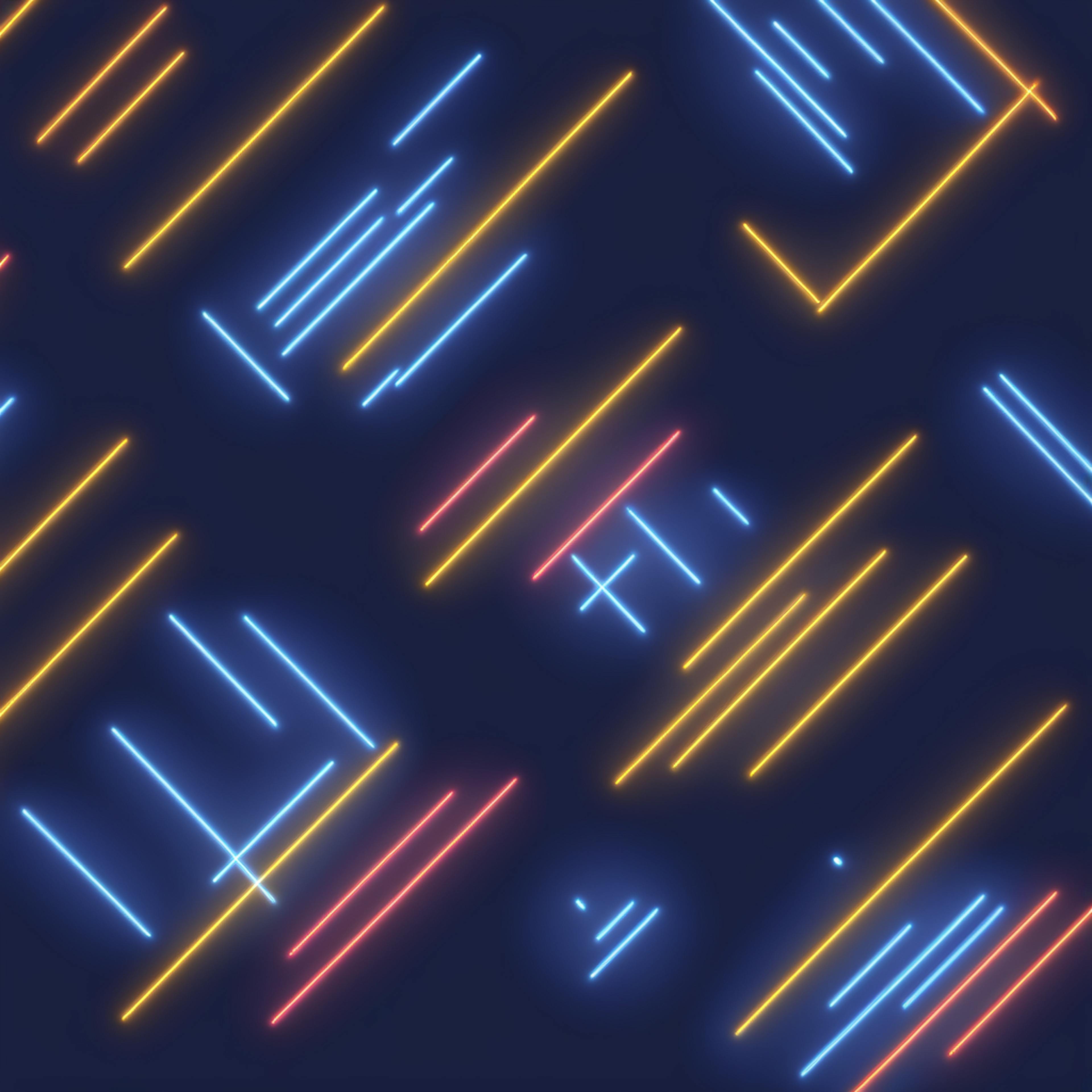 A pattern of diagonal neon lines in various colors, including blue, orange, and red, on a dark background, providing design inspiration with its energetic and visually stimulating arrangement.