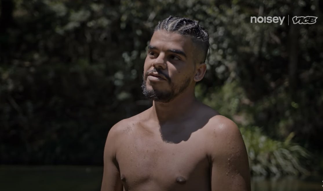 man with no shirt on