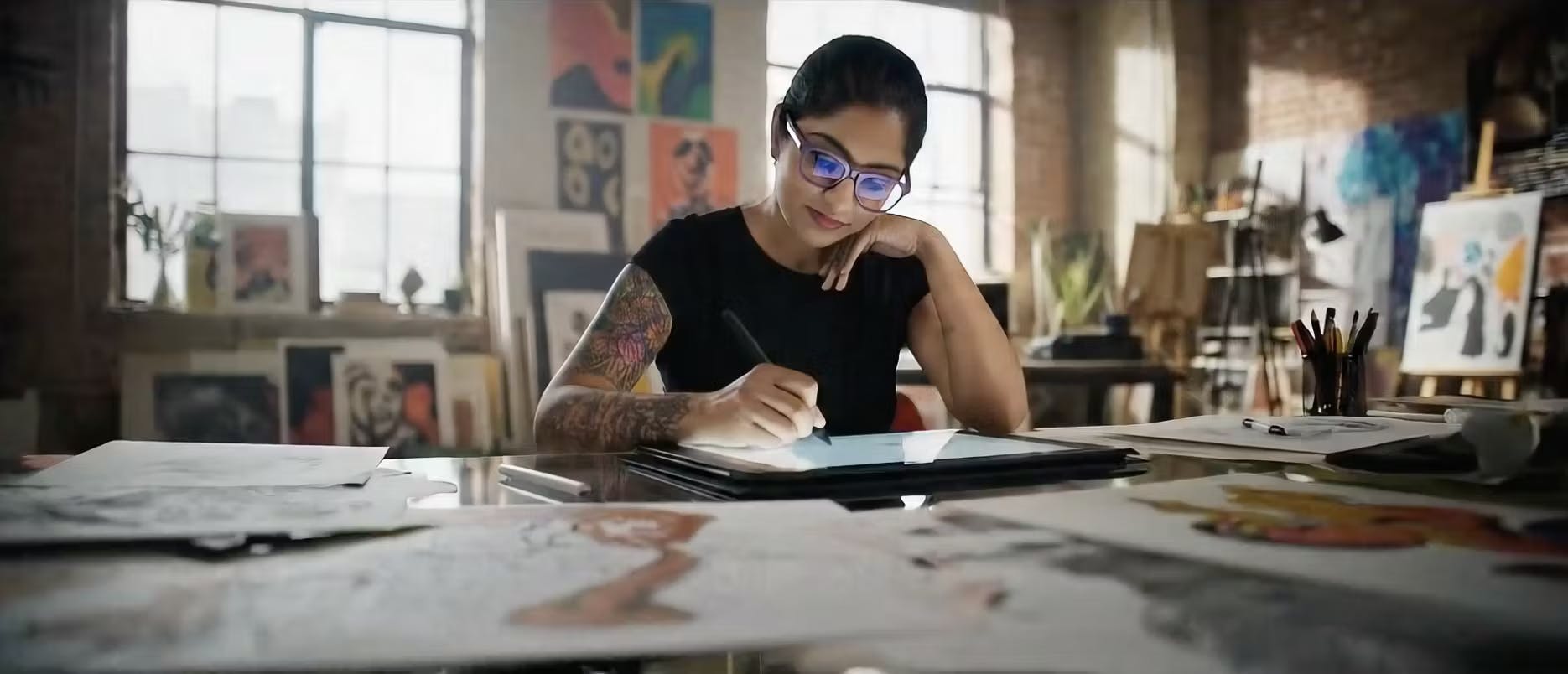 creative women drawing on an ipad