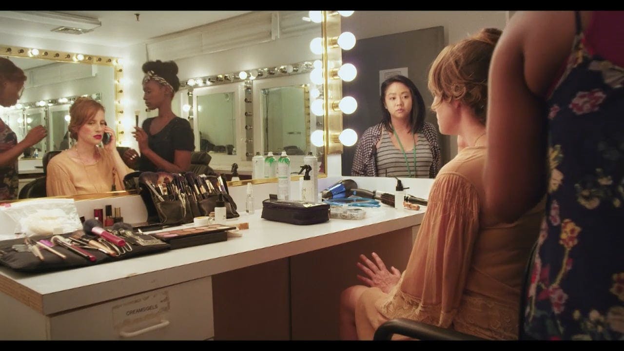 A woman in a makeup chair