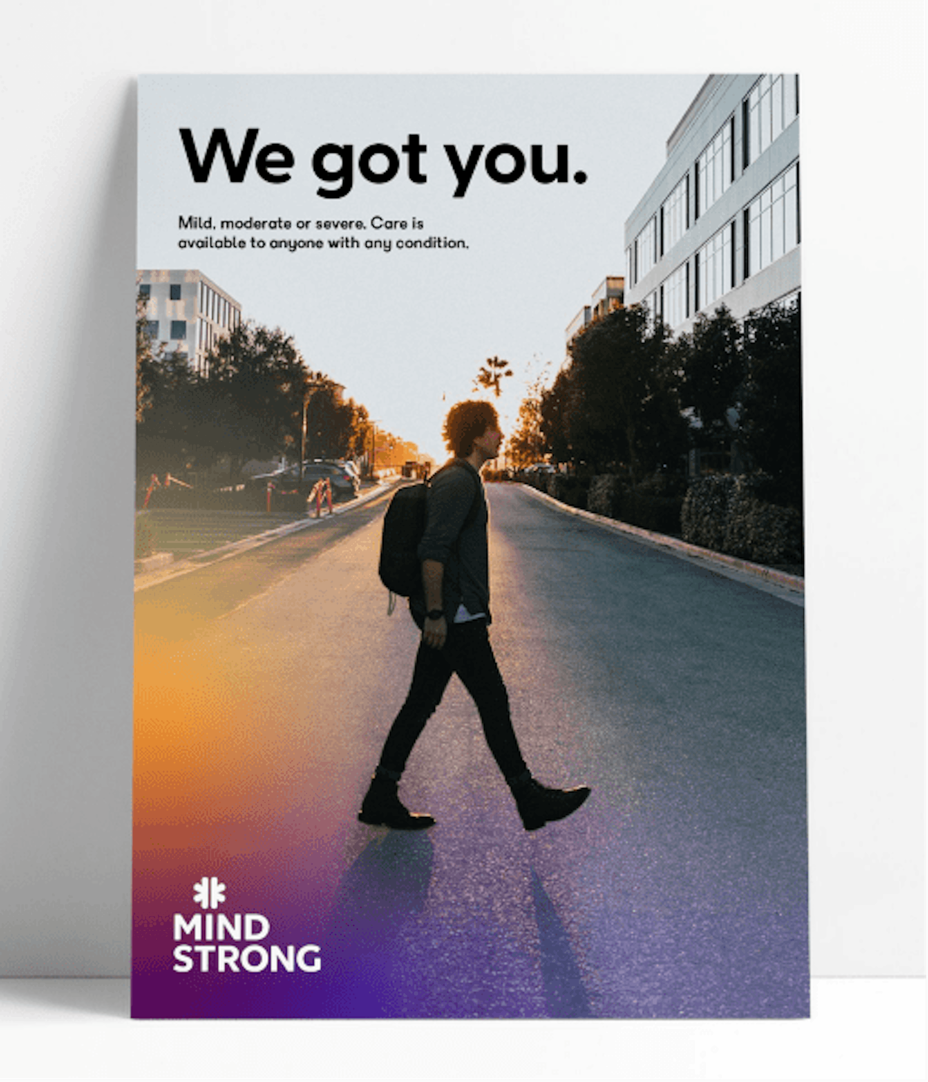 A Mindstrong branded photo of a man crossing a street.