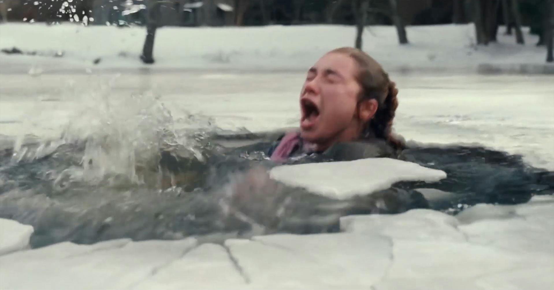 A woman drowning in icy water