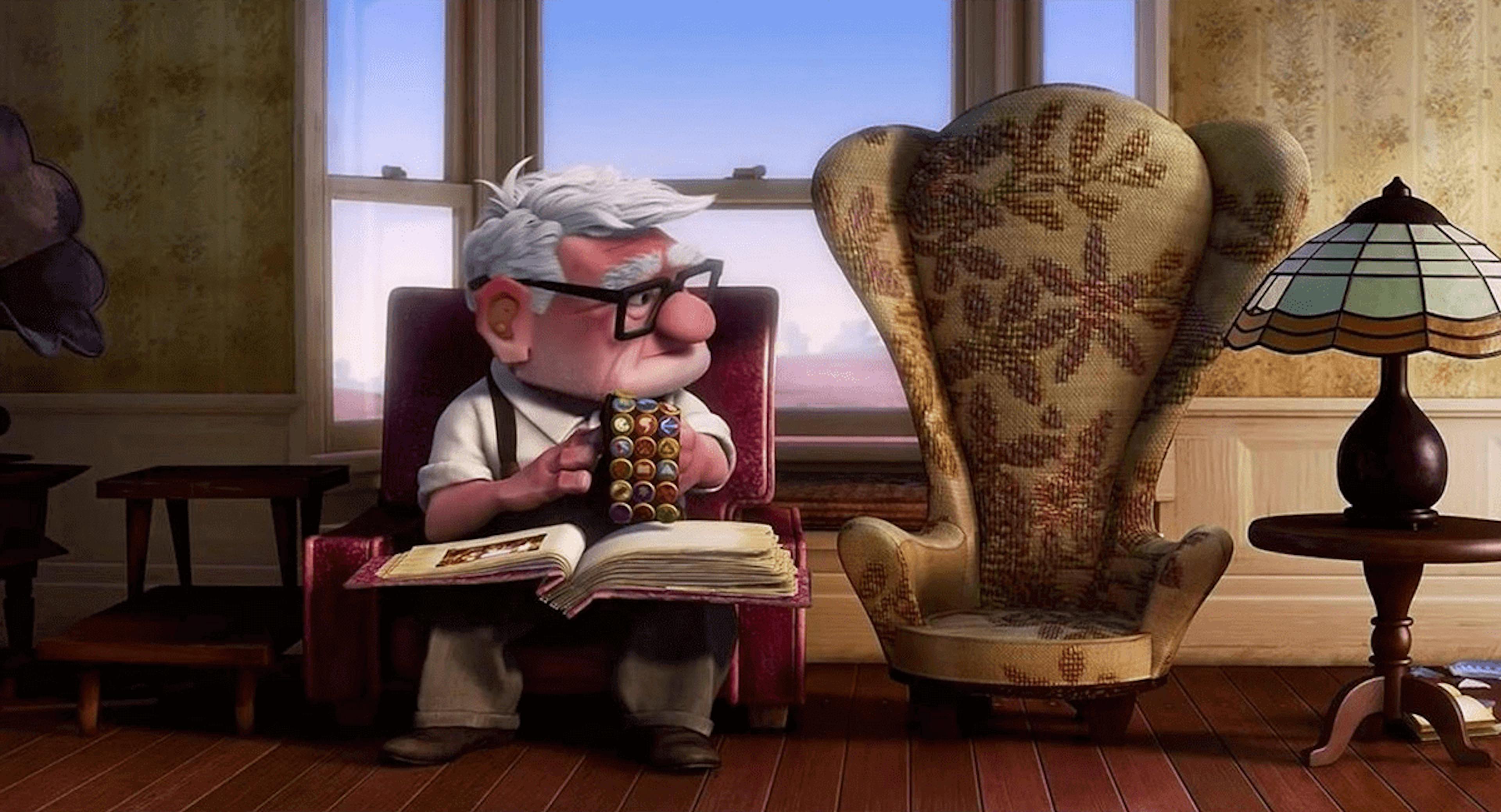 An old man from the movie Up looking at the empty chair of his deceased wife.
