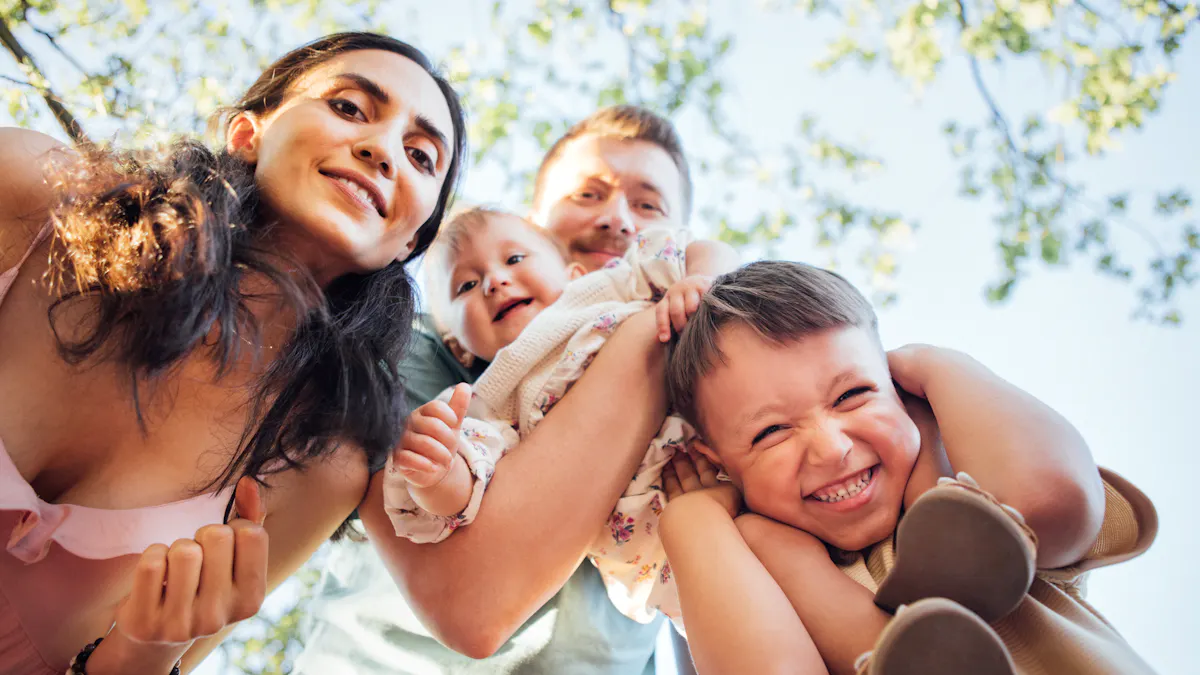 Caregiver and children together in a sunny garden, enjoying summer at home