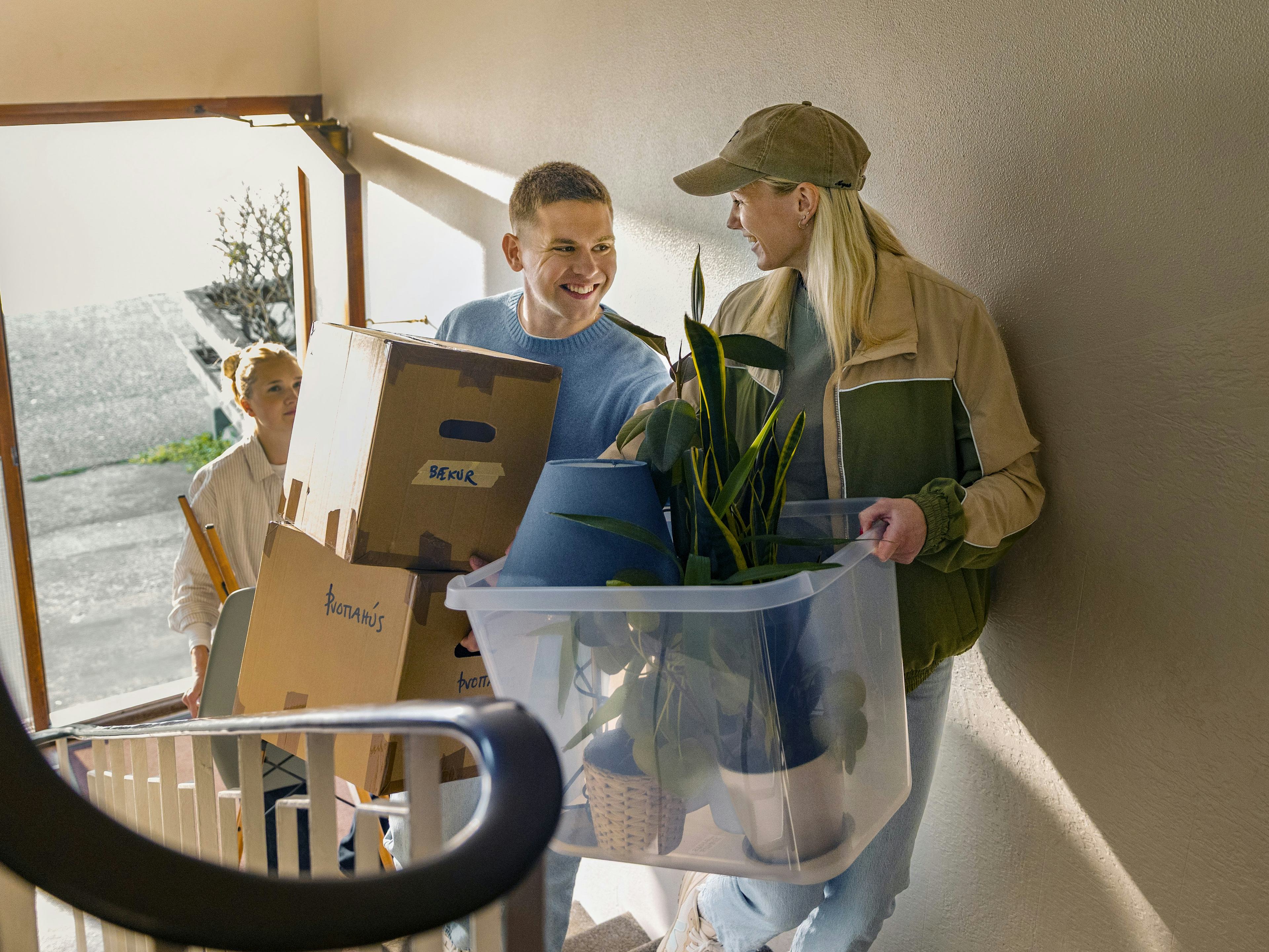 Fjölskylda á stigagangi