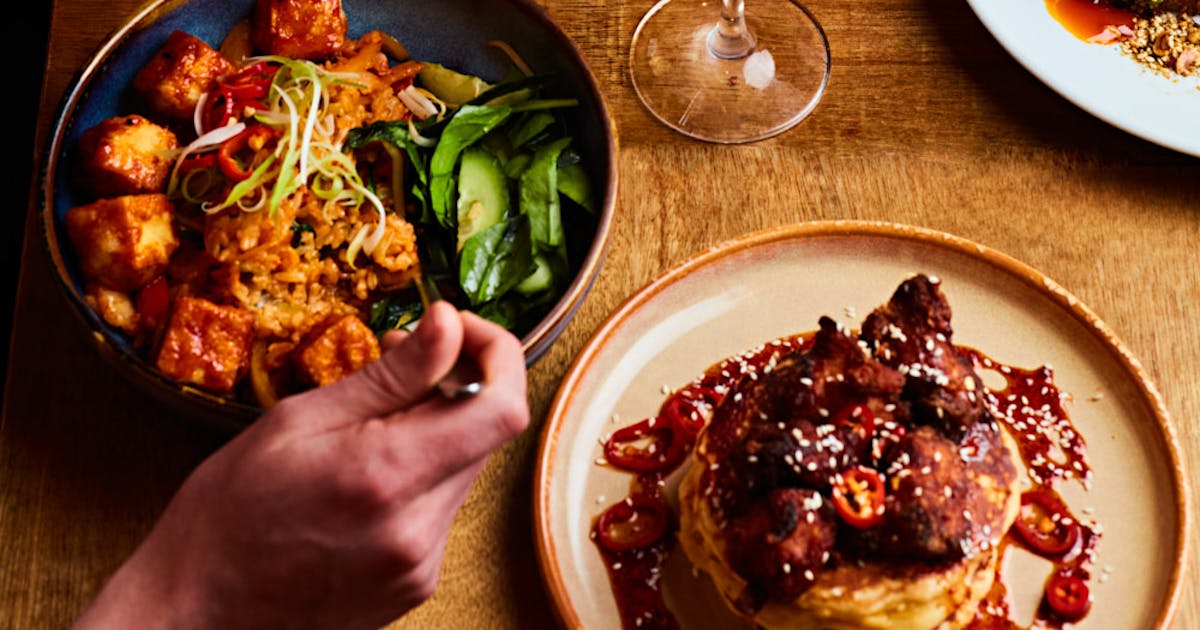 Brunch table with pancakes, Korean rice and bottomless Prosecco