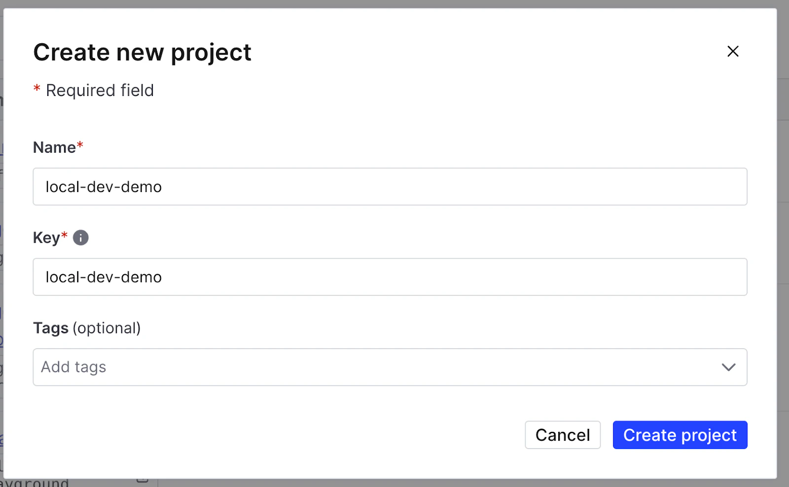 Form for creating a new project in LaunchDarkly, filled with the project name and key as "local-dev-demo."